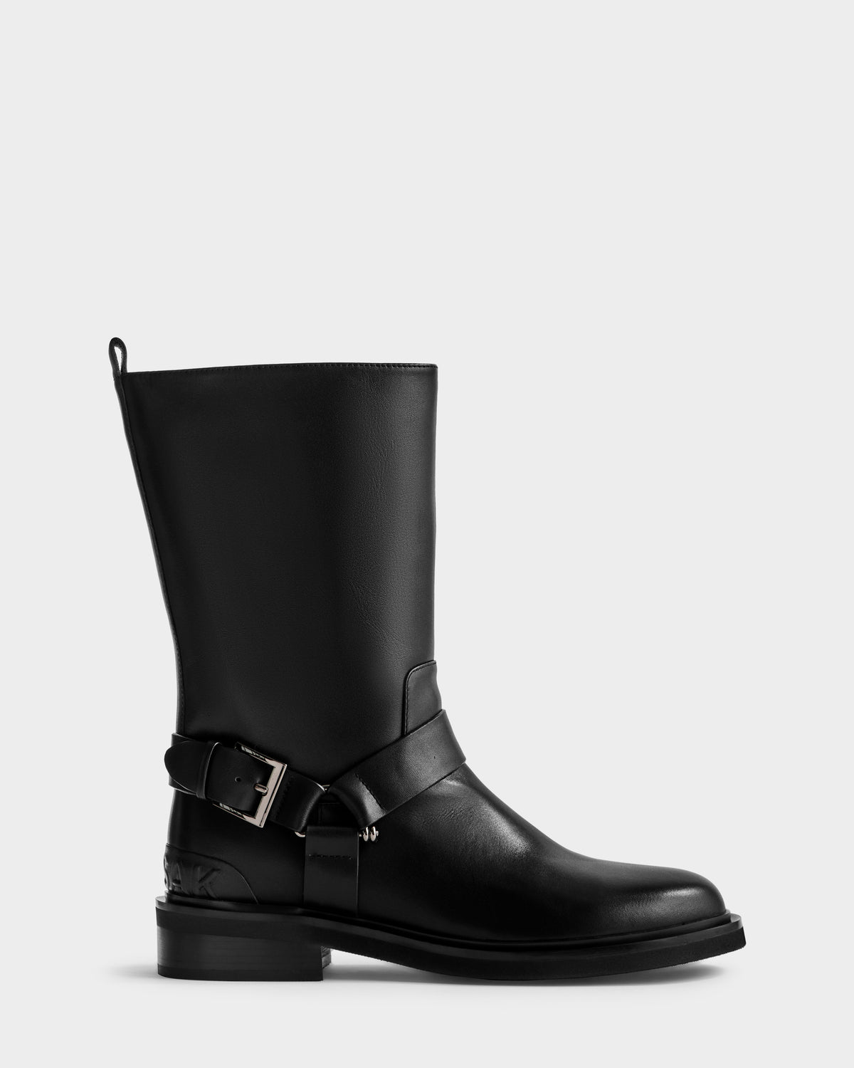 The Rudsak KIRRA - 8225558 Black is a women's black leather mid-calf moto boot with a rounded toe, silver buckle strap detail, low block heel, and back pull tab—versatile and stylish for any look.