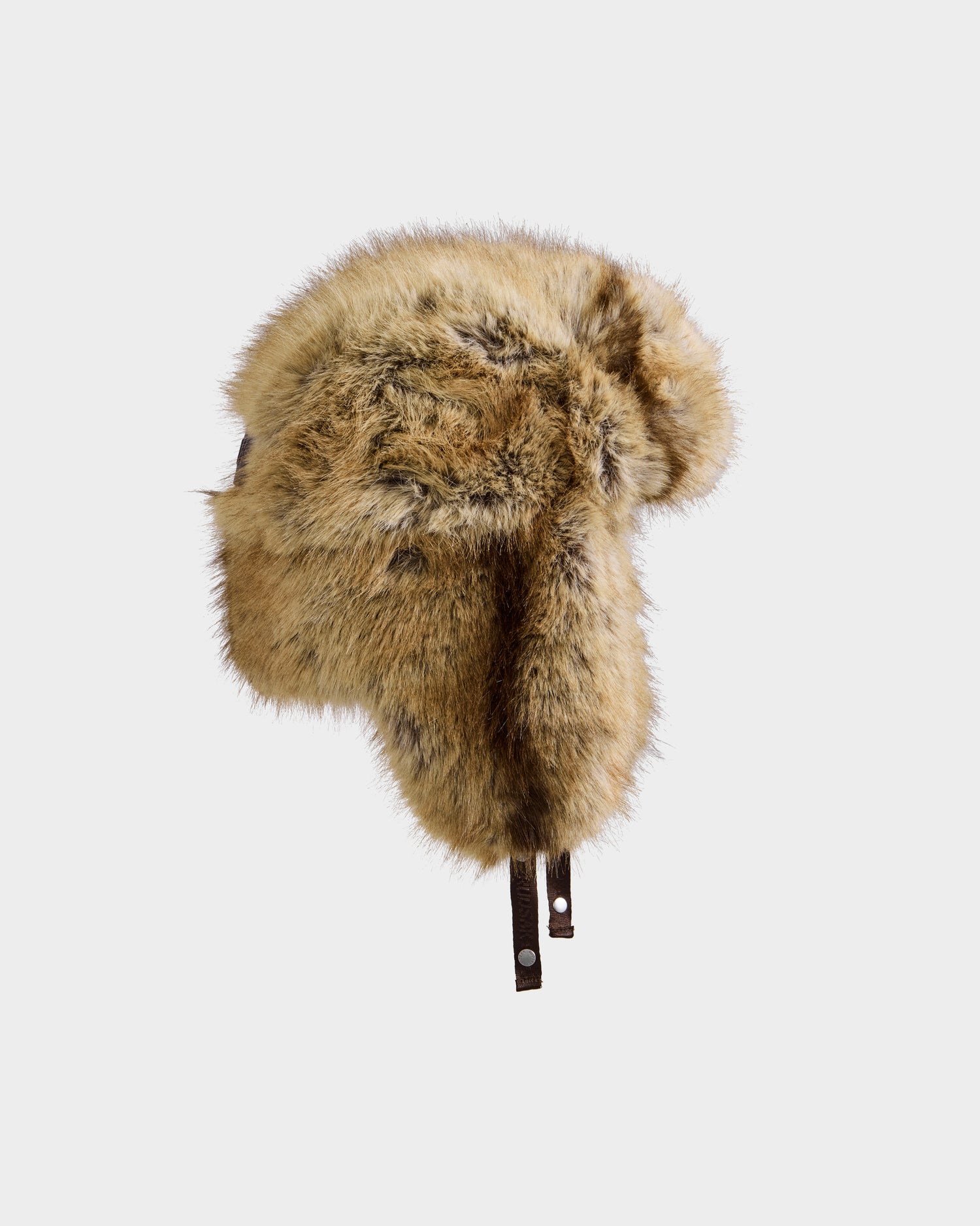 The Rudsak LIRA - 8425024 Mix Mocha is a women's brown and tan faux fur aviator hat with ear flaps and leather straps featuring metal snaps, designed for après-ski style and winter warmth, shown on a plain white background.