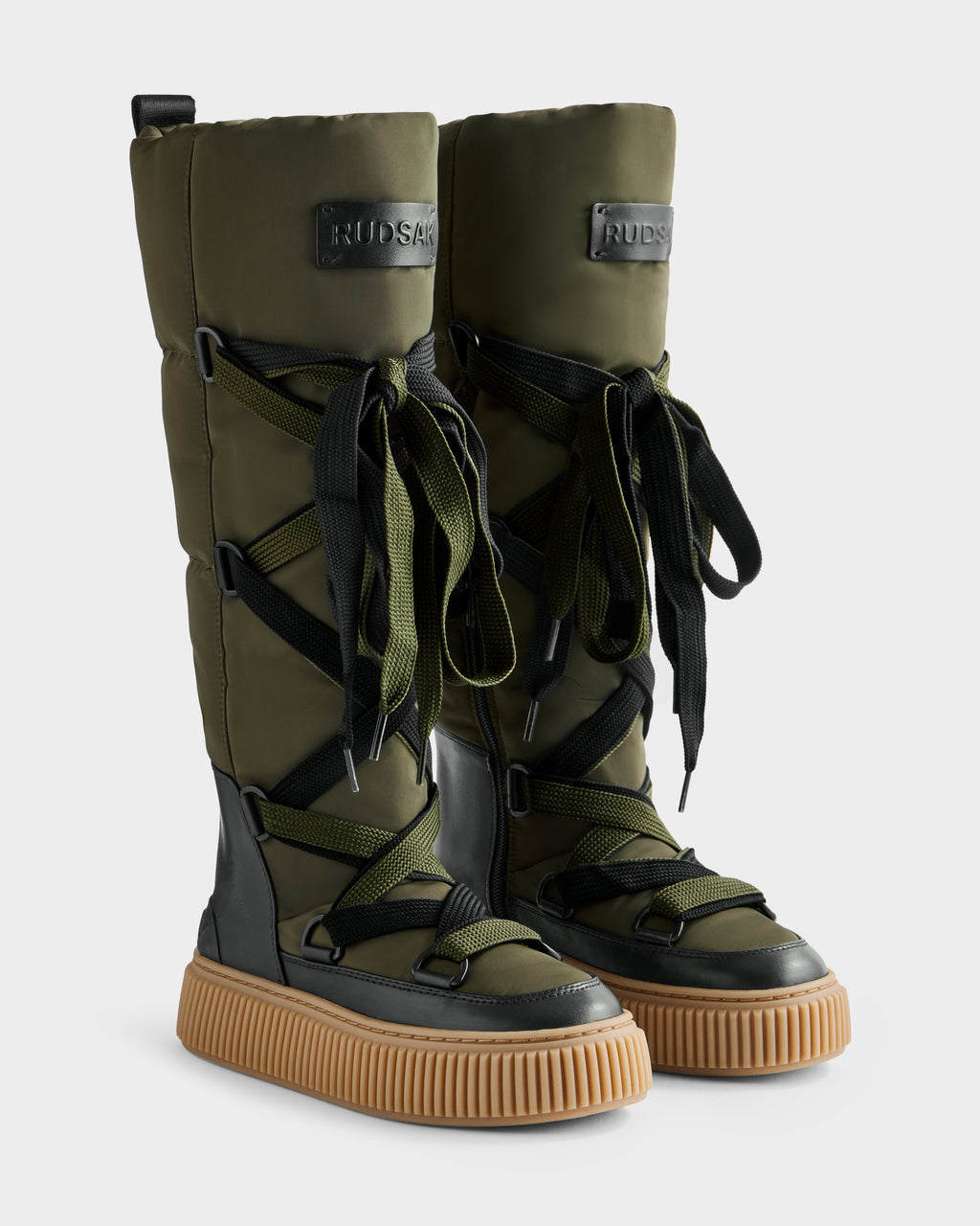 Rudsak PALERMO - 8225030 women’s winter boots in dark olive feature black accents, thick laces, insulated lining, rubber soles with grooved grip, and RUDSAK branding on the upper front.