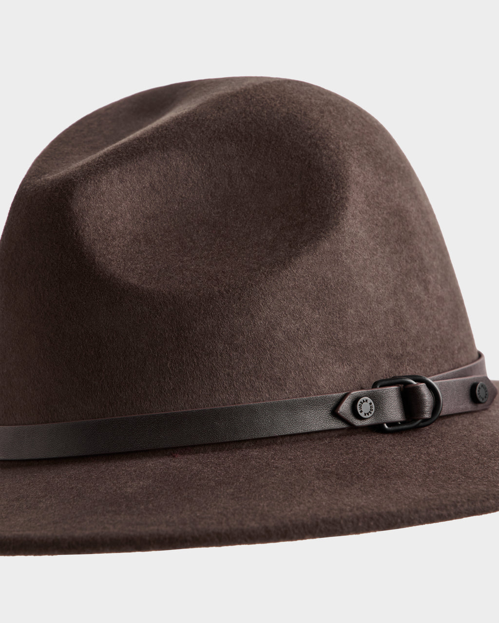The ZELDA - 8425536 Espresso by Rudsak is a womens wide-brim fedora in premium brown felted wool, featuring a black leather band with buckle detail and set against a plain light background.