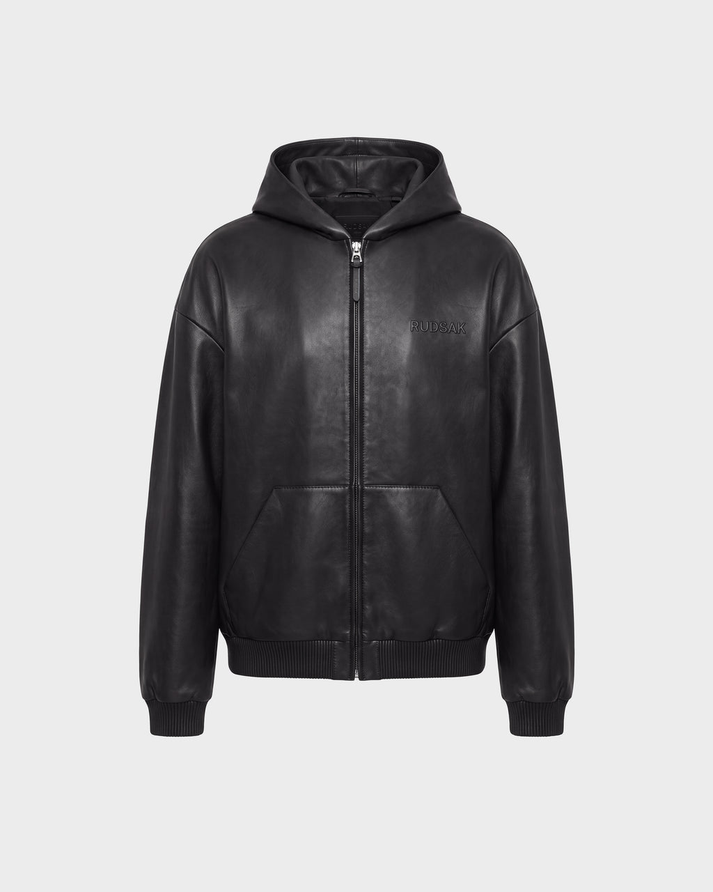 Rudsak ARCHIE - 6126500 Black leather hooded jacket featuring a front zipper, side pockets, ribbed cuffs and hem, and subtle embossed text on the left chest, displayed on a plain light gray background.