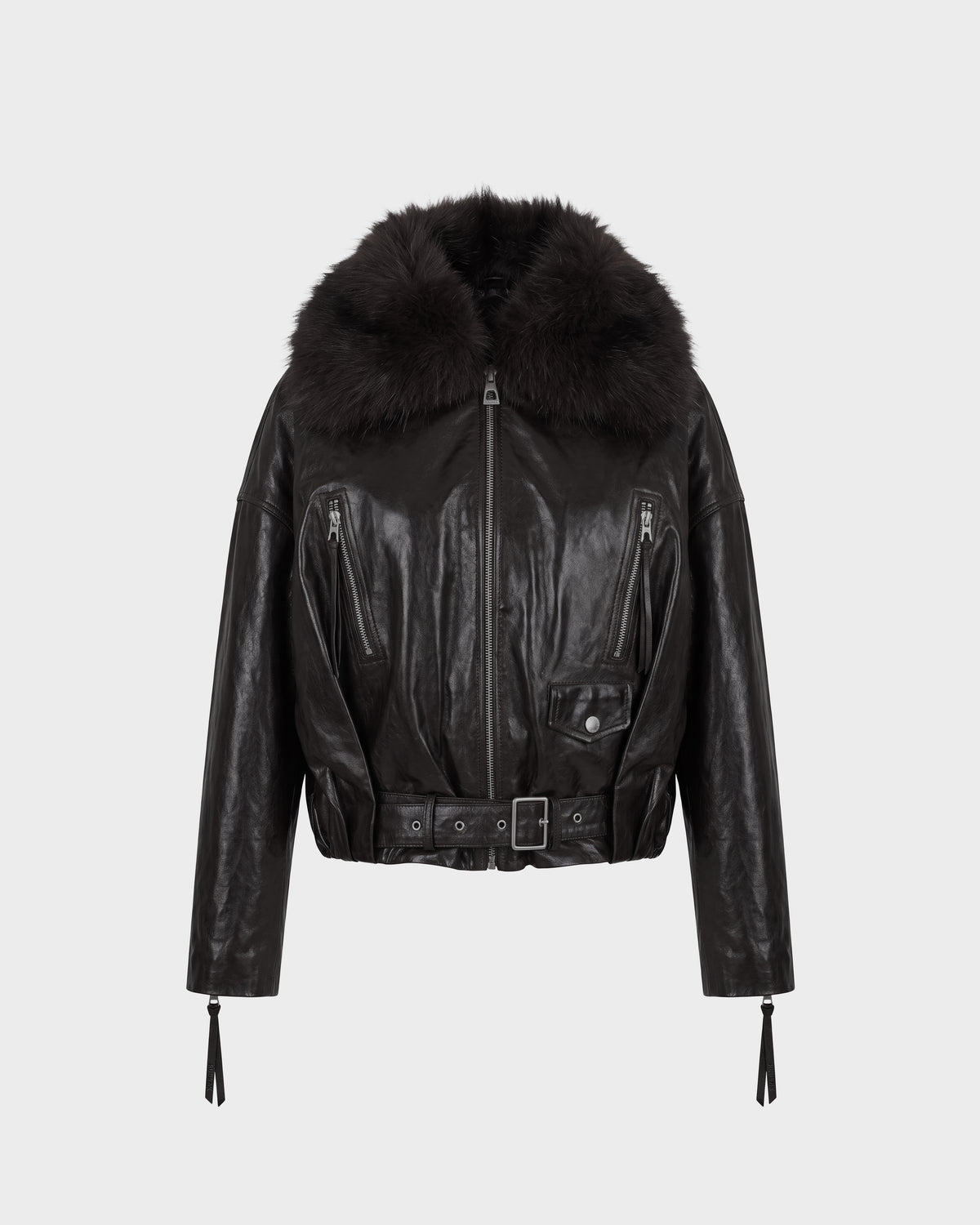 The Rudsak AVITA - 8126938 Black leather jacket features a wide, fluffy faux fur collar, a belted waist, zipper and button details, and zippered sleeves, shown against a plain white background.