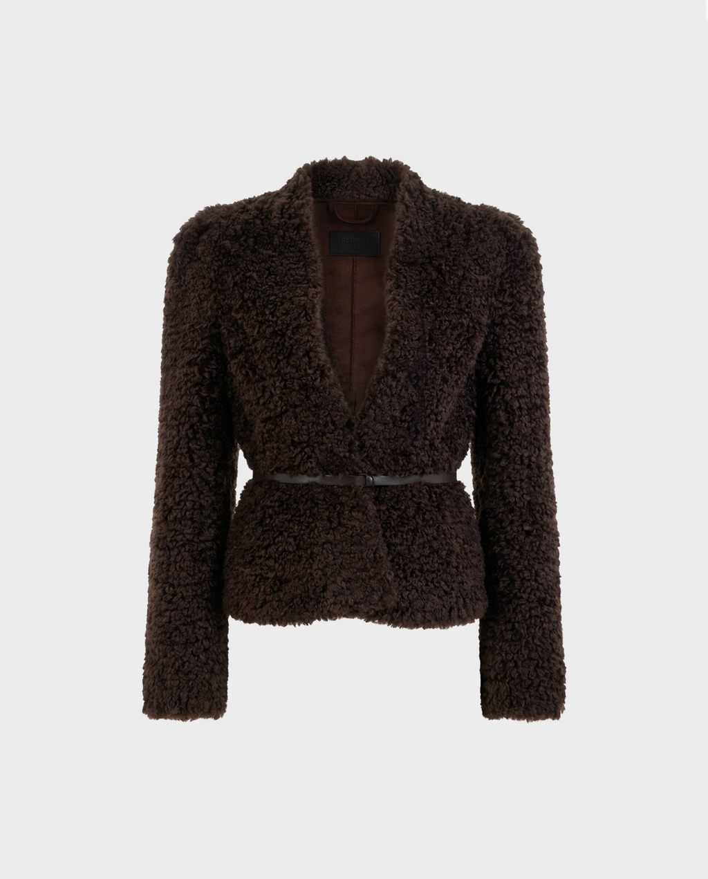 The BRINLEY - 8126980 Espresso by Rudsak features a dark brown, textured faux fur teddy blazer with long sleeves, an open front, and a thin black belt at the waist—perfect for transitional layering. Displayed against a plain white background.