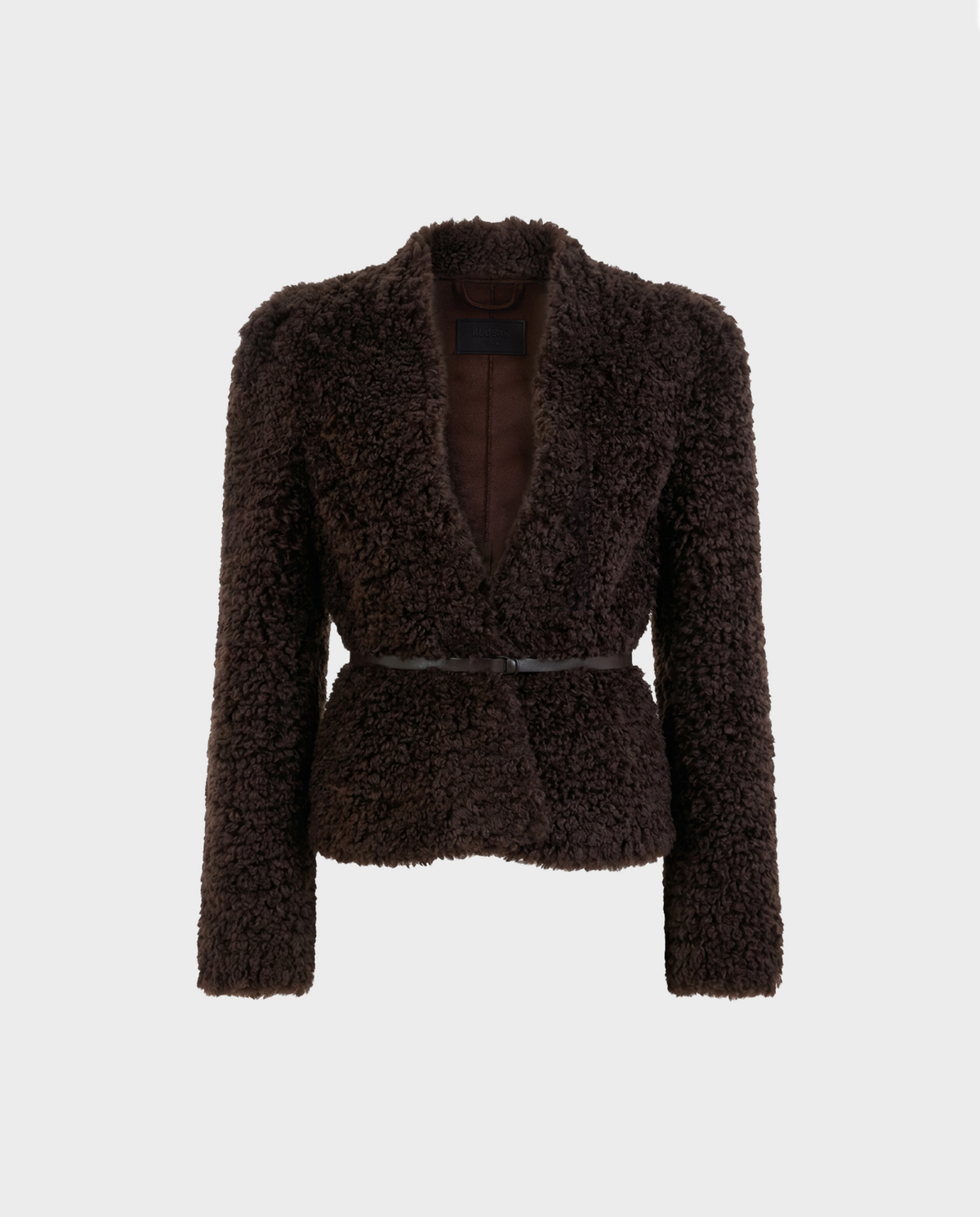 The BRINLEY - 8126980 Espresso by Rudsak features a dark brown, textured faux fur teddy blazer with long sleeves, an open front, and a thin black belt at the waist—perfect for transitional layering. Displayed against a plain white background.