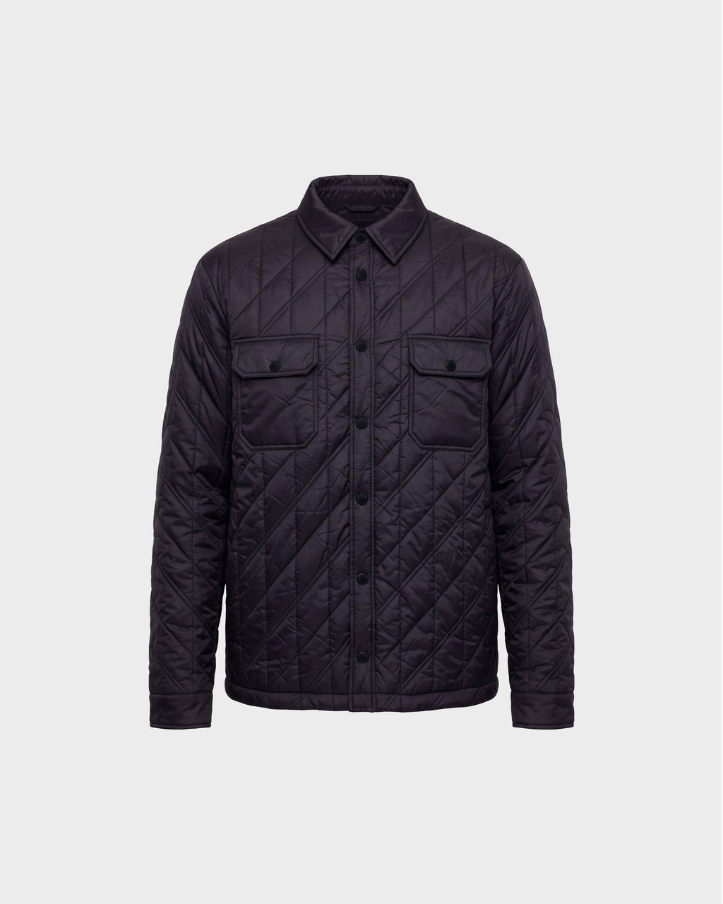 GRIFFIN - 6126758 Black quilted jacket by Rudsak, featuring a button-up front, two chest flap pockets, and a collar, displayed on a plain light gray background.
