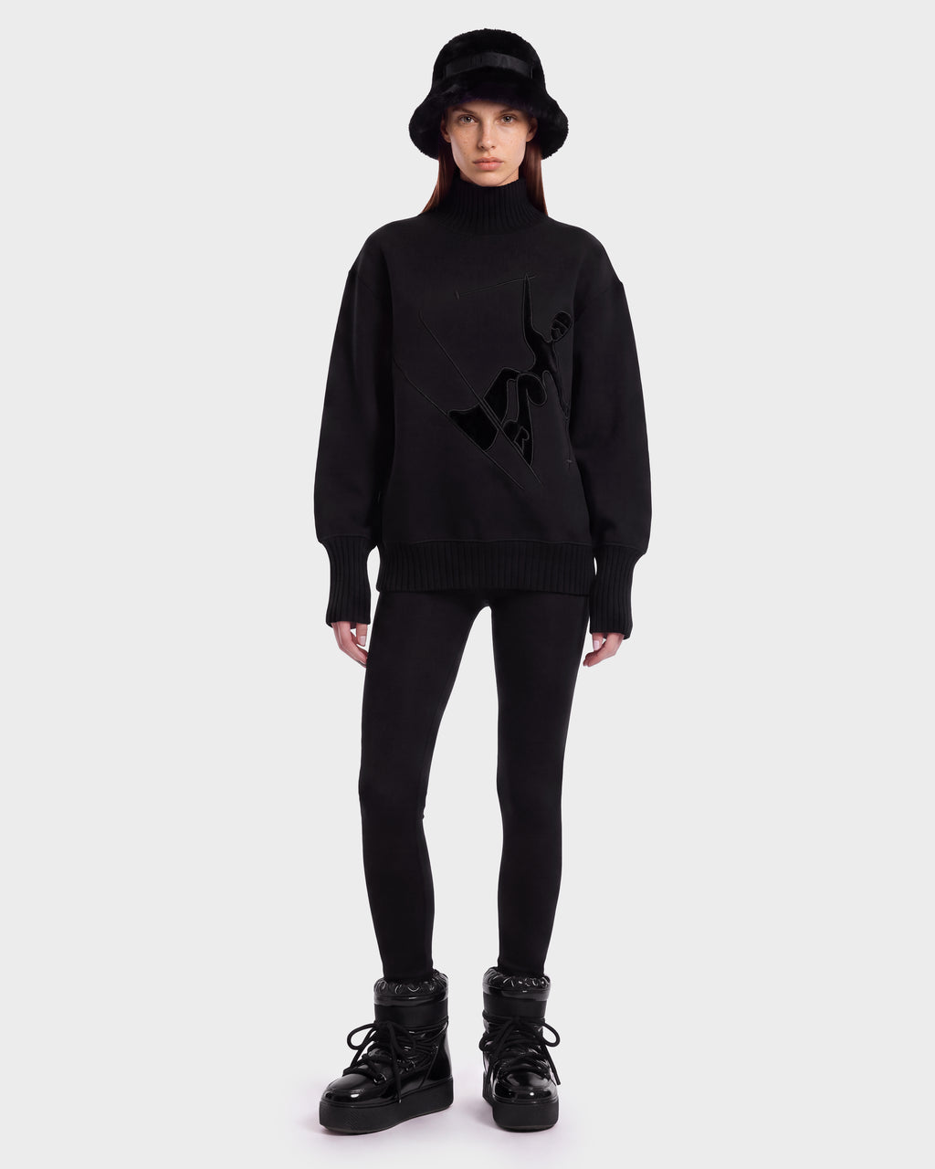 A person wearing the Rudsak JOYCE E - 8526538 Black stands against a plain white background.