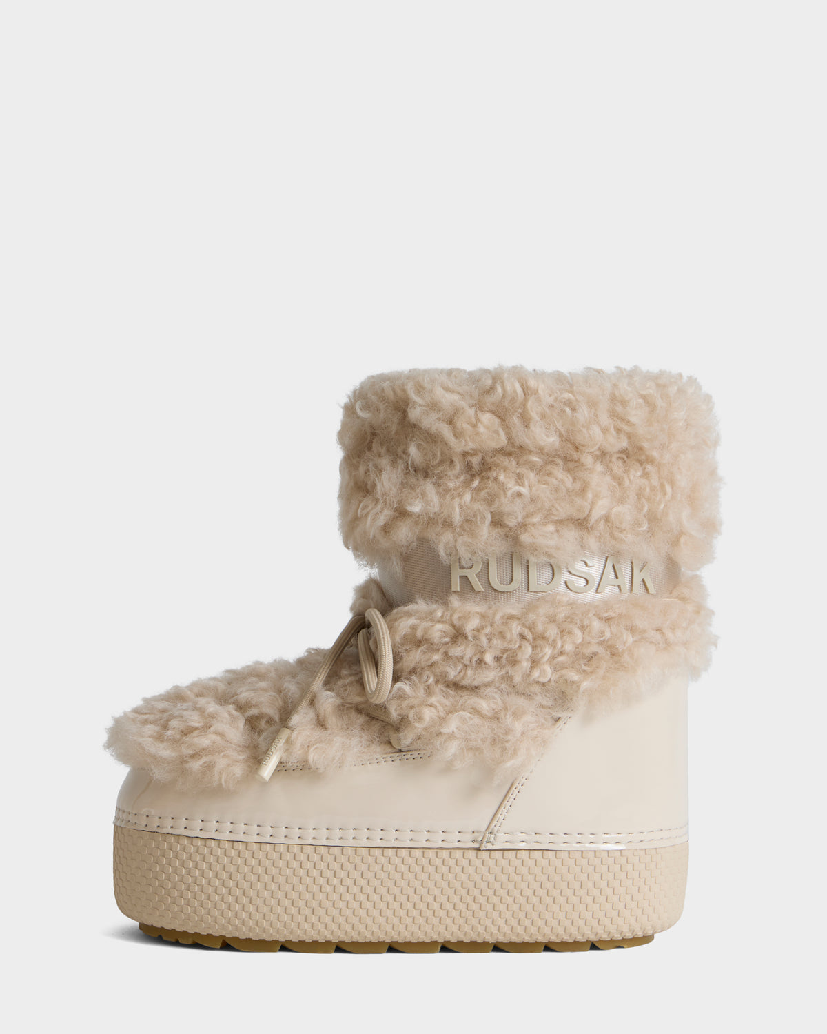 Rudsak KATHY Y - 1224500 Vanilla cream-colored platform boot with a textured, fluffy collar and a branded strap across the ankle.