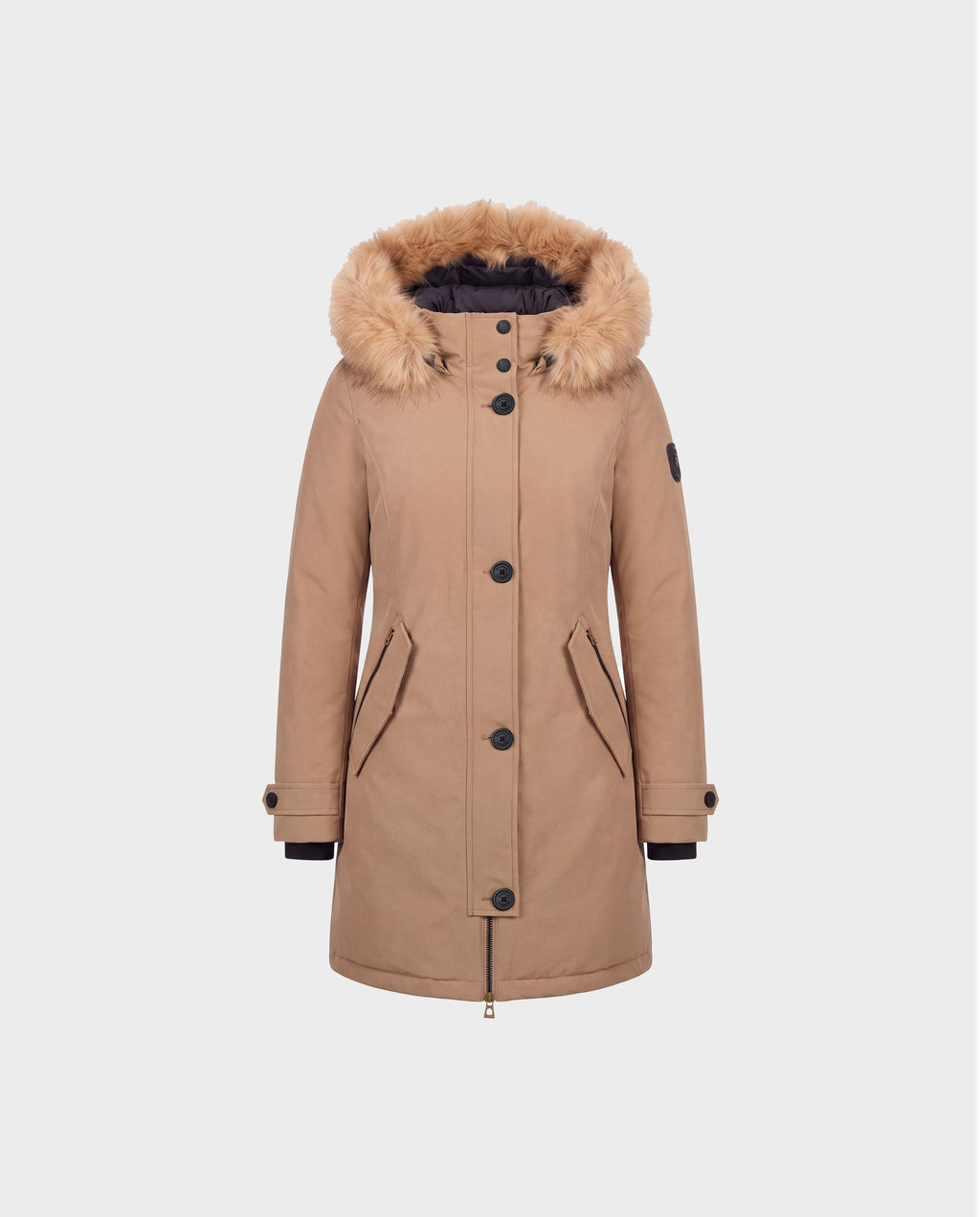 The Rudsak KEYSHIA - 8126517 Camel women’s down parka features a faux fur-lined hood, black buttons, front zipper, two front pockets, and a patch on the left sleeve. Crafted with ethically sourced RDS-certified down for cozy winter warmth, this stylish tan parka is displayed against a plain light gray background.