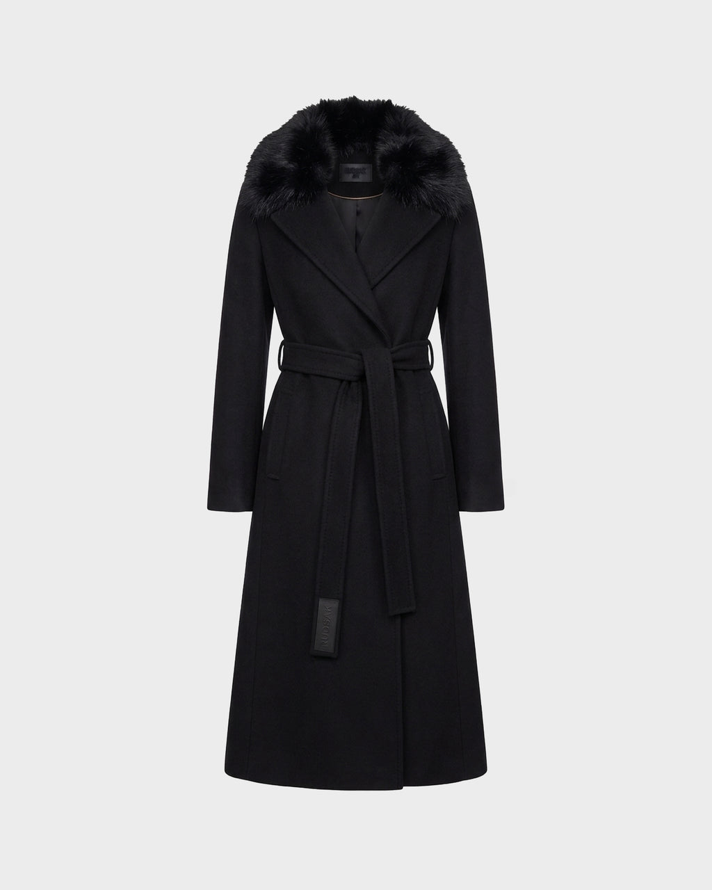 The Rudsak MEL - 8126525 Black is a long tailored wool coat in classic black, featuring a wide removable faux fur collar, long sleeves, belted waist, and two side pockets, displayed against a plain light gray background.