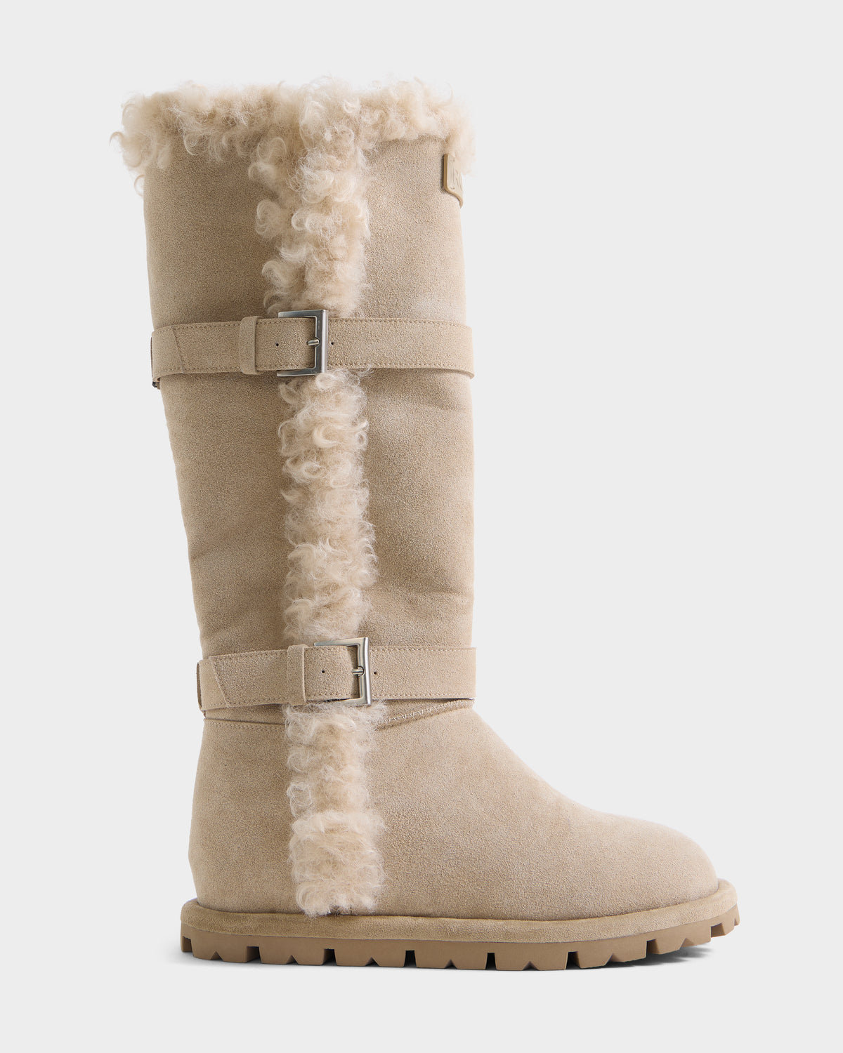 Rudsak MISTRA - L226506 Cream knee-high suede boot with shearling trim, two buckled straps, and a lugged rubber sole.