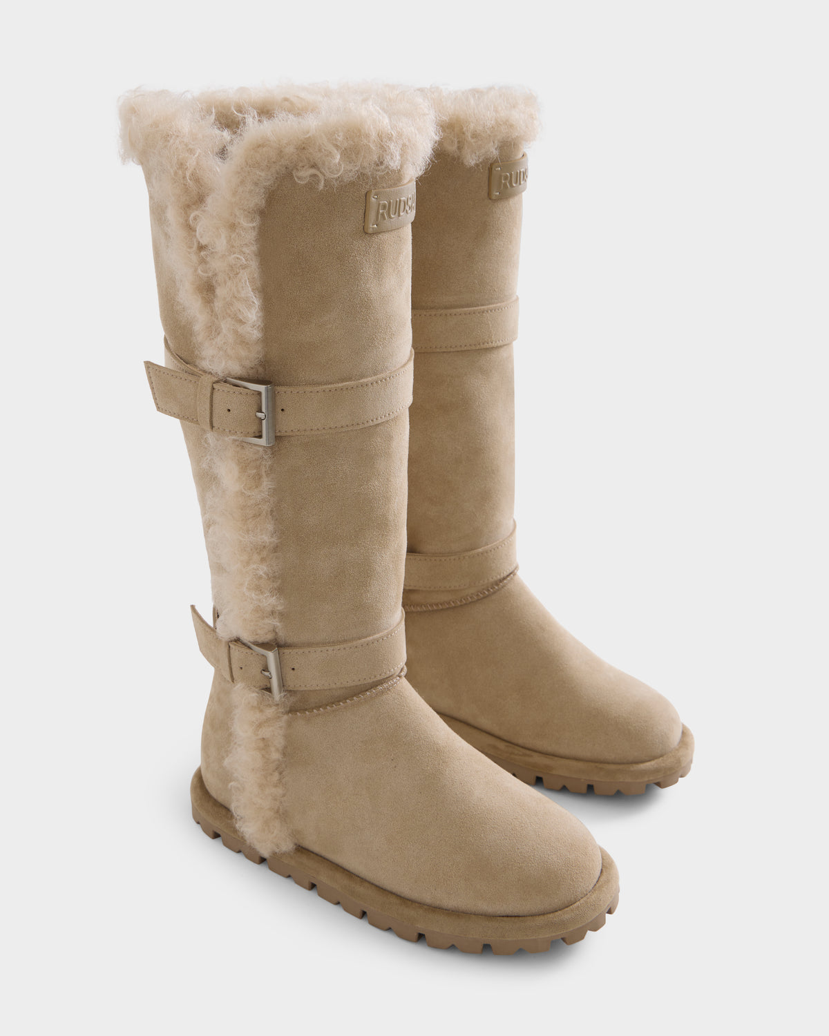 Rudsak MISTRA - L226506 Cream knee-high boots in cream-colored suede, lined with fleece and featuring two adjustable buckle straps and a thick lug sole.