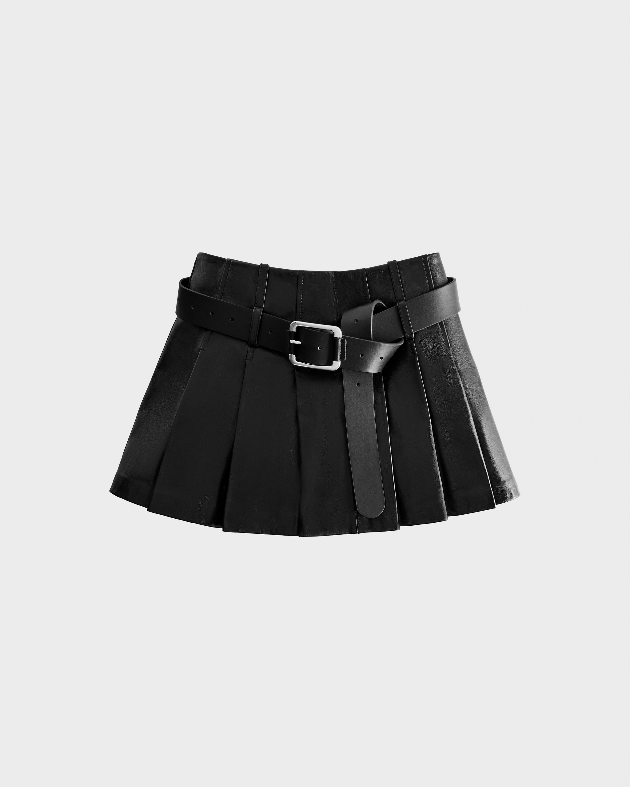The FELICITY - 8525650 Black by Rudsak is a black pleated leather mini skirt with a wide matching belt and silver buckle, displayed on a plain light gray background.