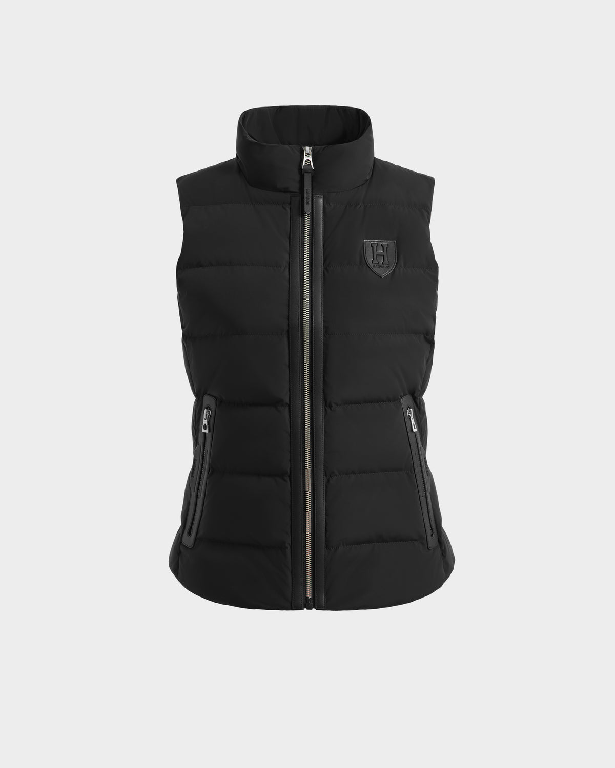 The GABRIELA HV - H125507 Black by Rudsak is a limited-edition, sleeveless puffer vest with a high collar, two zippered side pockets, front zipper closure, RDS-certified down, and an embossed logo on the left chest.
