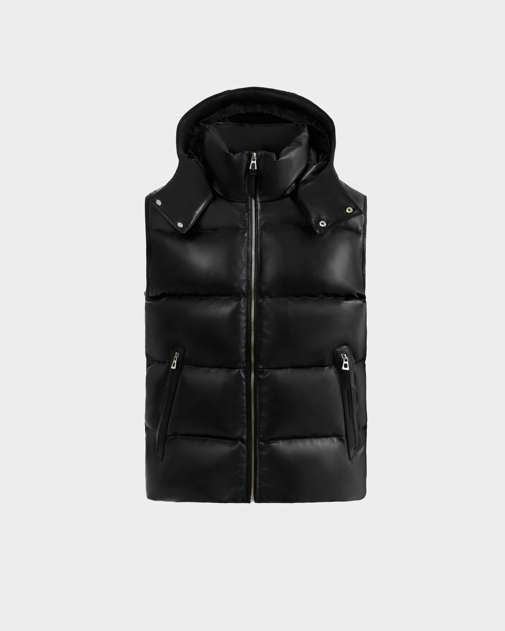 The Rudsak HENRY X - 6125679 Black is a men’s sleeveless leather quilted vest with a removable hood, front zipper, and two zippered pockets, shown with a smooth, shiny finish against a plain light gray background.