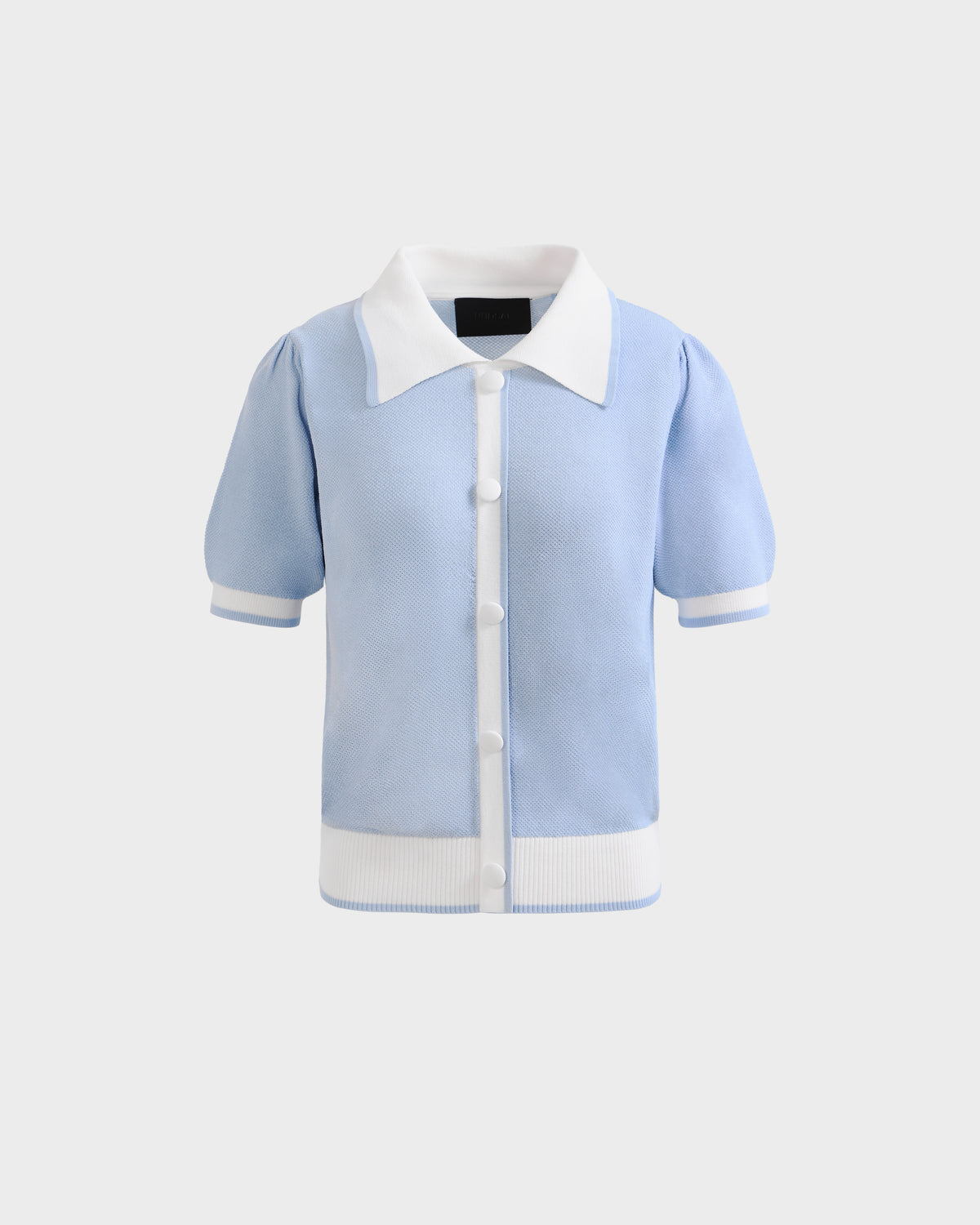 The IRIS - 8526012 Powder Blue short-sleeve sweater by Rudsak features a white contrast collar, button-down front, sleeve trim, and waistband, shown on a plain light gray background.