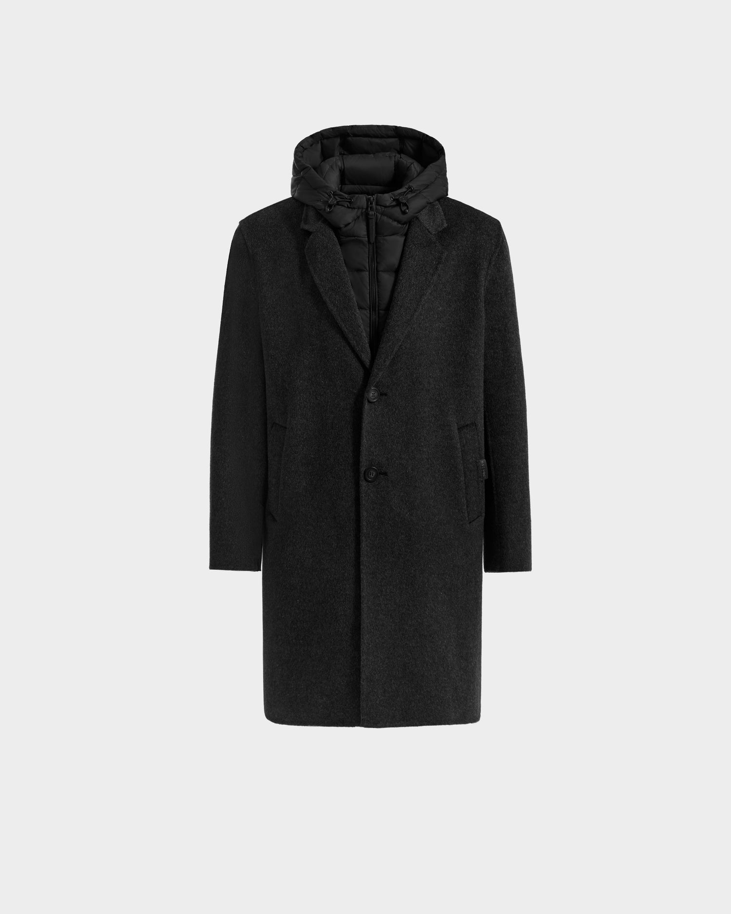 The Rudsak JEREMIAH - 6125509 Grey is a men’s wool-blend coat with a hood, quilted lining, removable down-insulated inner dickie, two front buttons, and side pockets—styled here against a plain light background.