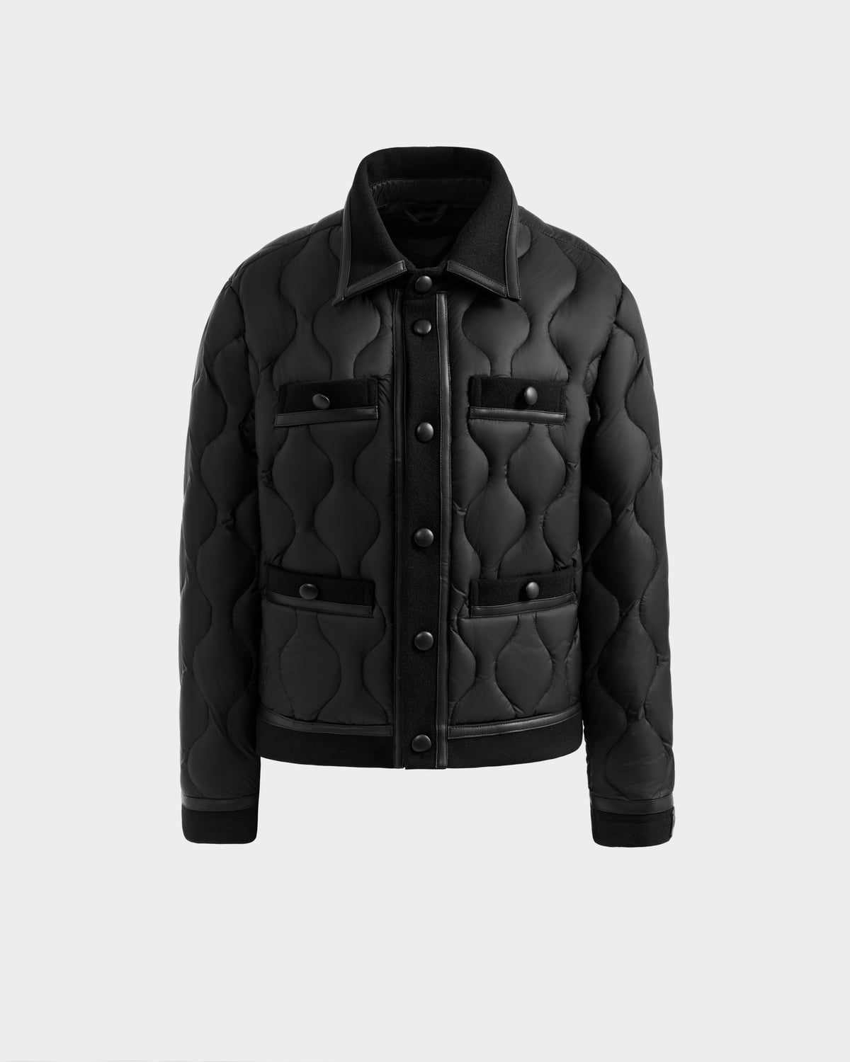 The JOLIE - 8125036 Black by Rudsak is a women’s quilted down jacket with a collar, button-down front, and four front pockets, made with RDS-certified down. Shown on a plain light gray background.
