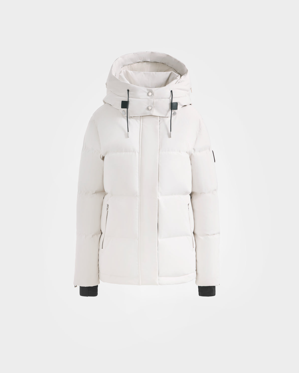 The Rudsak JOON H - 8125586 Vanilla is a white women's down jacket with a hood, front zipper, snap buttons, black drawstrings, quilted design, high collar, long sleeves with black cuffs, and a modern look.