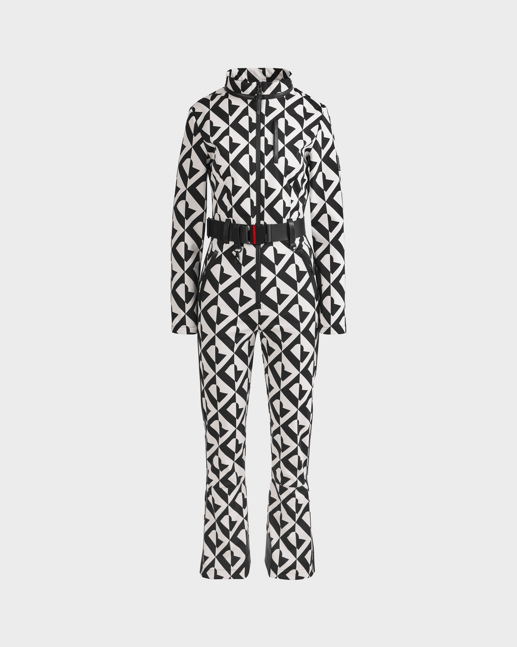 The Rudsak JOSIE - 8124817 Vanilla Monogram women’s ski suit features a black and white geometric print, fitted waist, front zipper, high collar, flared legs, and RECCO rescue technology, shown on a plain white background.