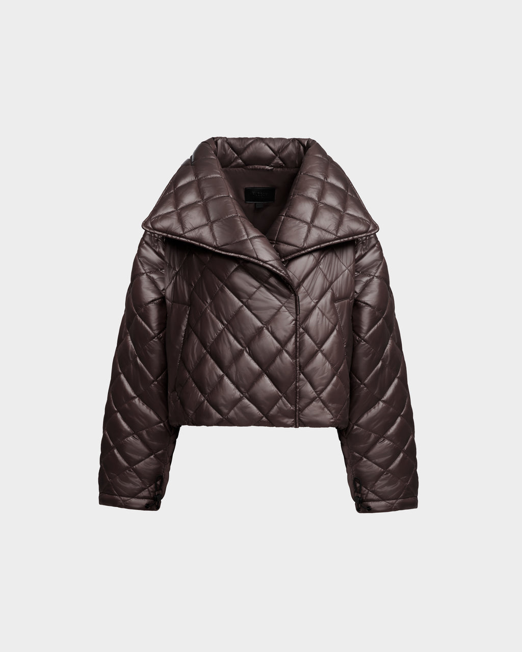 The Rudsak KALEE - 8124005 Espresso is a women's dark brown quilted light jacket with a cropped silhouette, wide collar, and diamond stitching, shown on a plain light gray background.