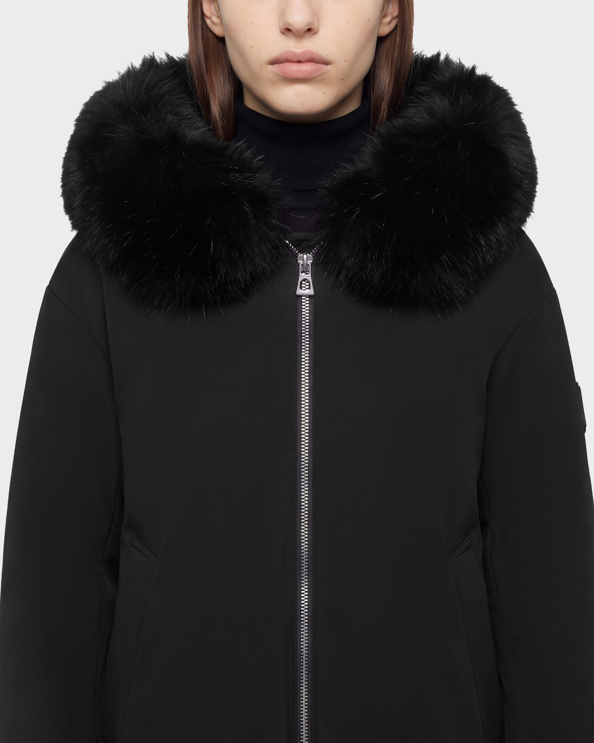 Rudsak KATHLEEN - 8126764 Black zip-up jacket with a black fur-trimmed hood.