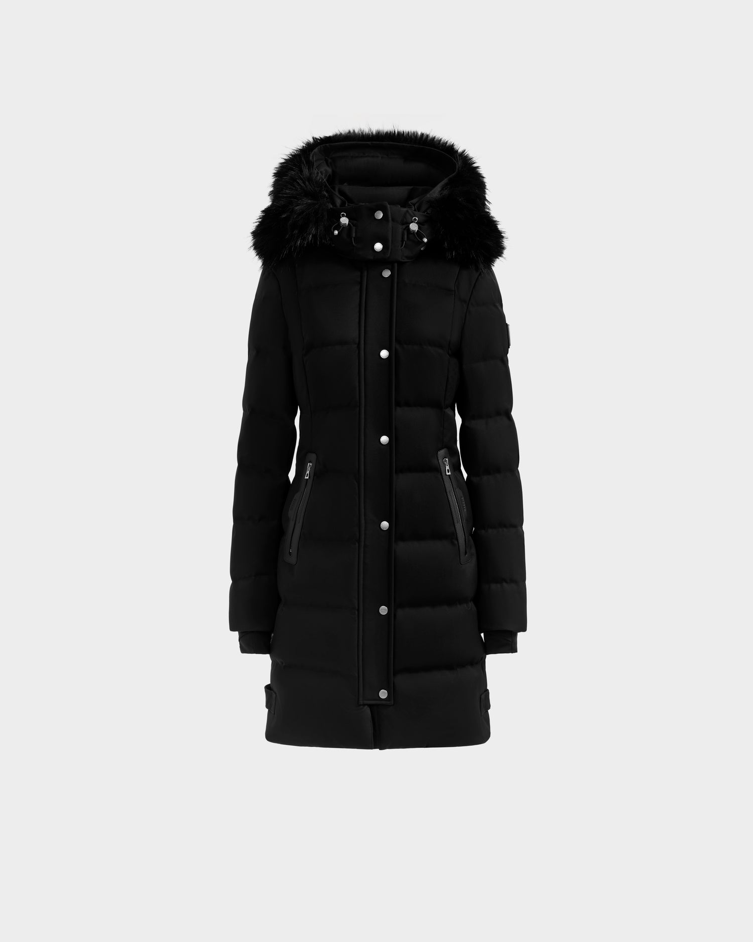 The Rudsak KEHLANI H - 8125643 Black is a long women’s down parka with a black faux fur-trimmed hood, front zipper and snap buttons, zippered side pockets, and RDS-certified down for warmth, shown against a plain light background.
