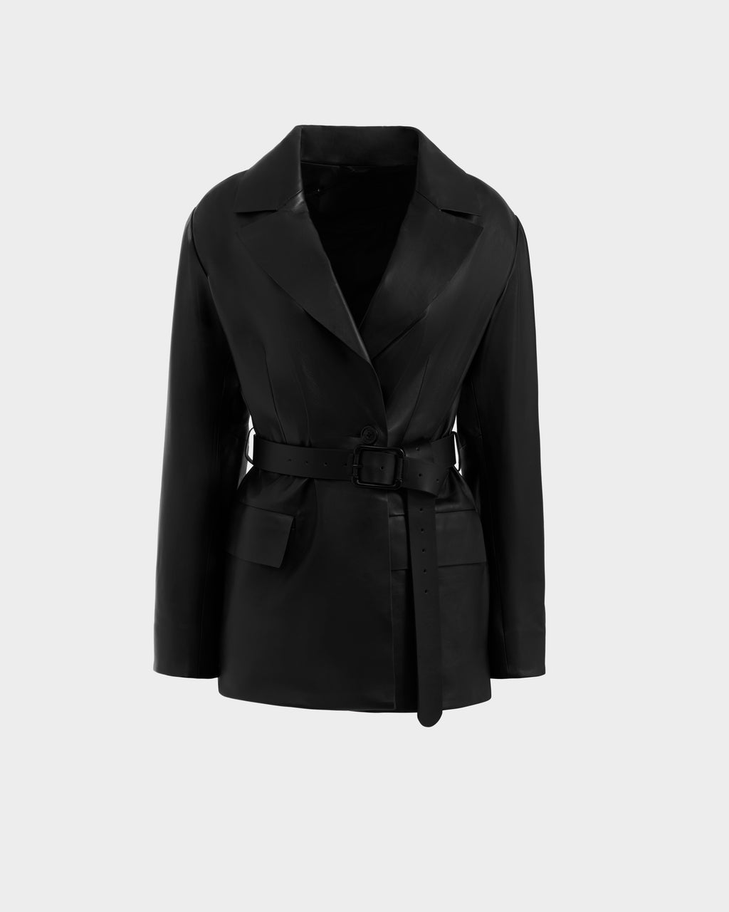 The Rudsak KENDALL - 8125617 Black is a women’s leather blazer with a notched lapel, long sleeves, front flap pockets, and a matching waist belt, shown on a light gray background for an effortlessly chic tailored look.