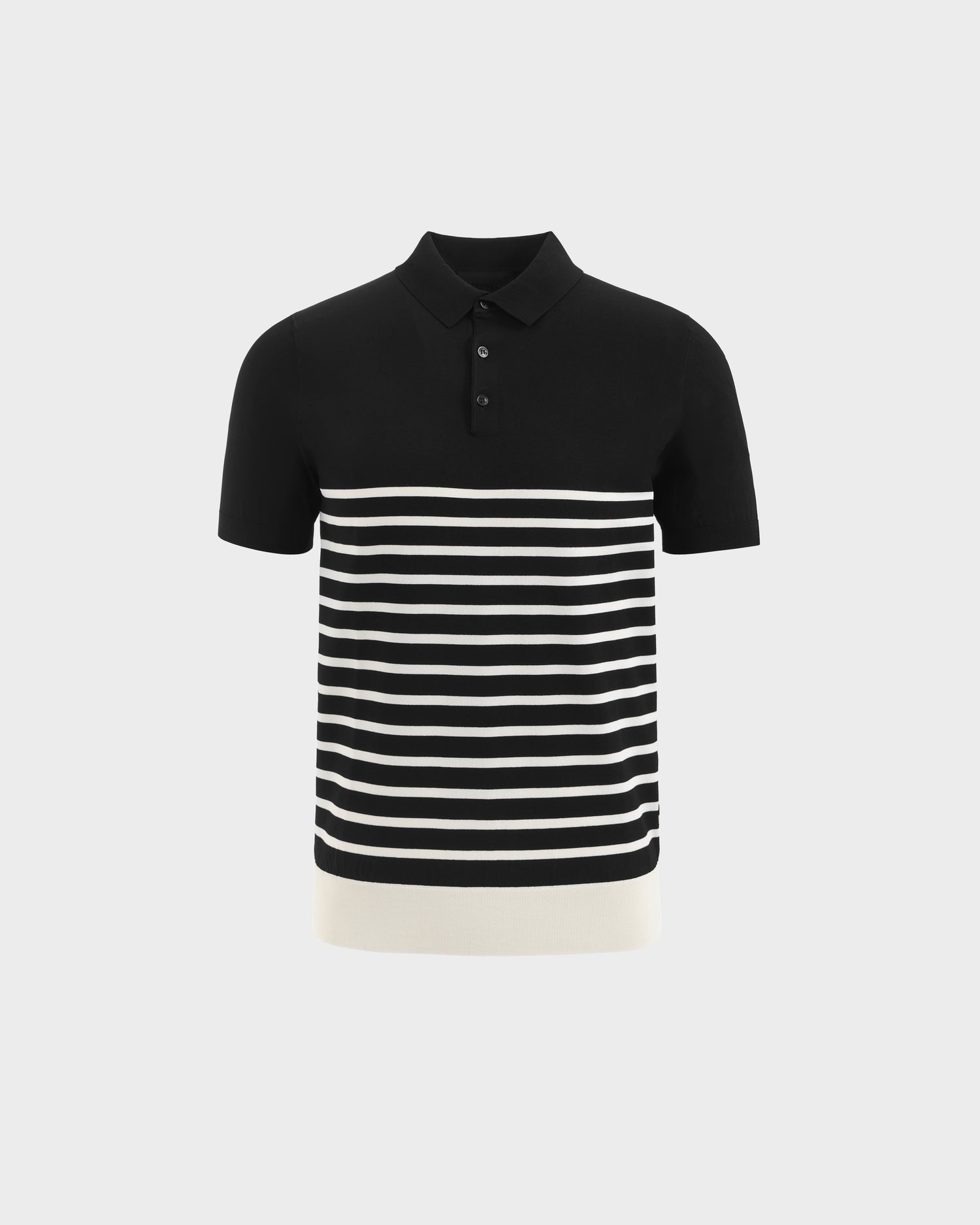 The KRIS - 6526005 Black by Rudsak is a short-sleeved, fine-gauge knit polo with a collar, three buttons, and contrasting lower stripes. A solid white hem adds graphic flair. Shown on a plain light gray background.
