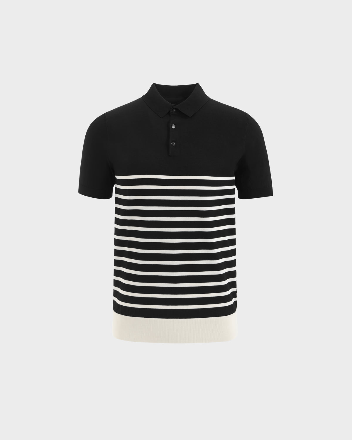 The KRIS - 6526005 Black by Rudsak is a short-sleeved, fine-gauge knit polo with a collar, three buttons, and contrasting lower stripes. A solid white hem adds graphic flair. Shown on a plain light gray background.