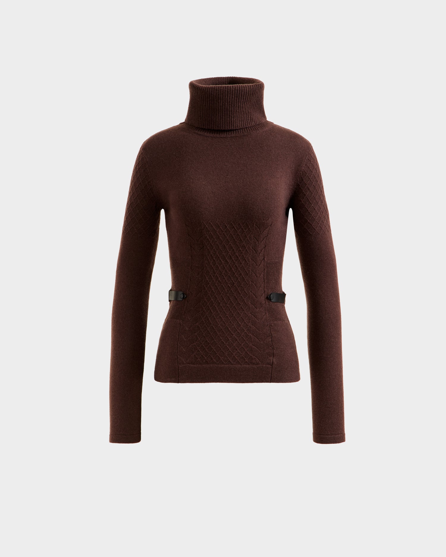 The Rudsak LAURA - 8524596 Mocha is a brown women's knit turtleneck sweater featuring a fitted silhouette, quilted front, vegan leather trim, and decorative side buckles, shown on a plain light grey background.