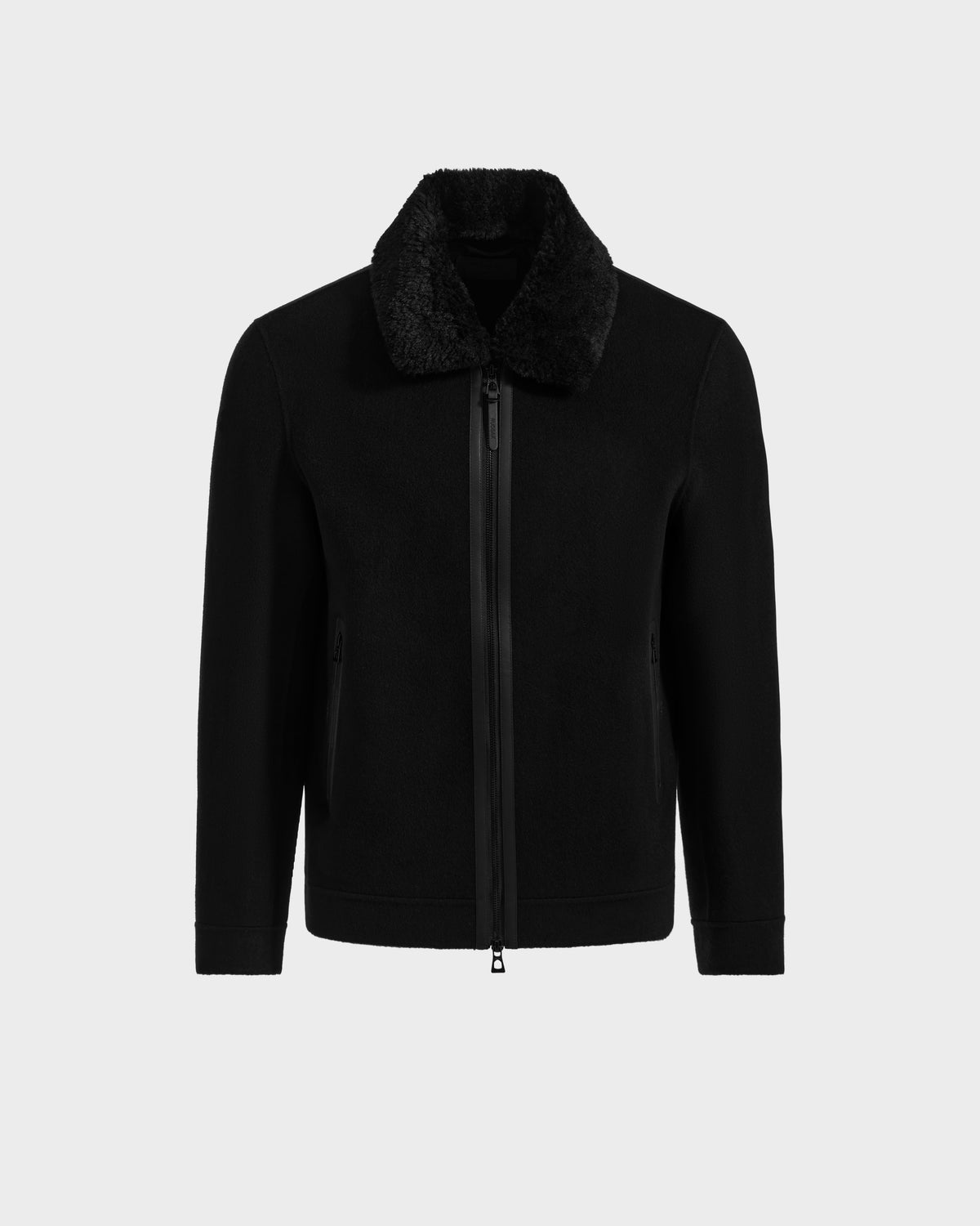 The Rudsak LINCOLN - 6125038 Black jacket features a removable faux fur collar, front zipper closure, and two side pockets, shown against a plain light gray background.