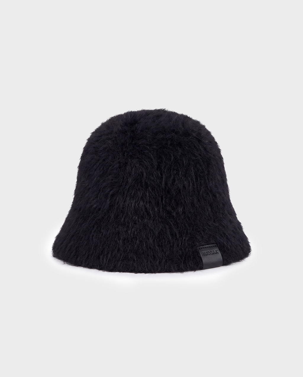 Black Rudsak MAIE - 8426517 fuzzy bucket hat with a small branded leather tab on the brim.