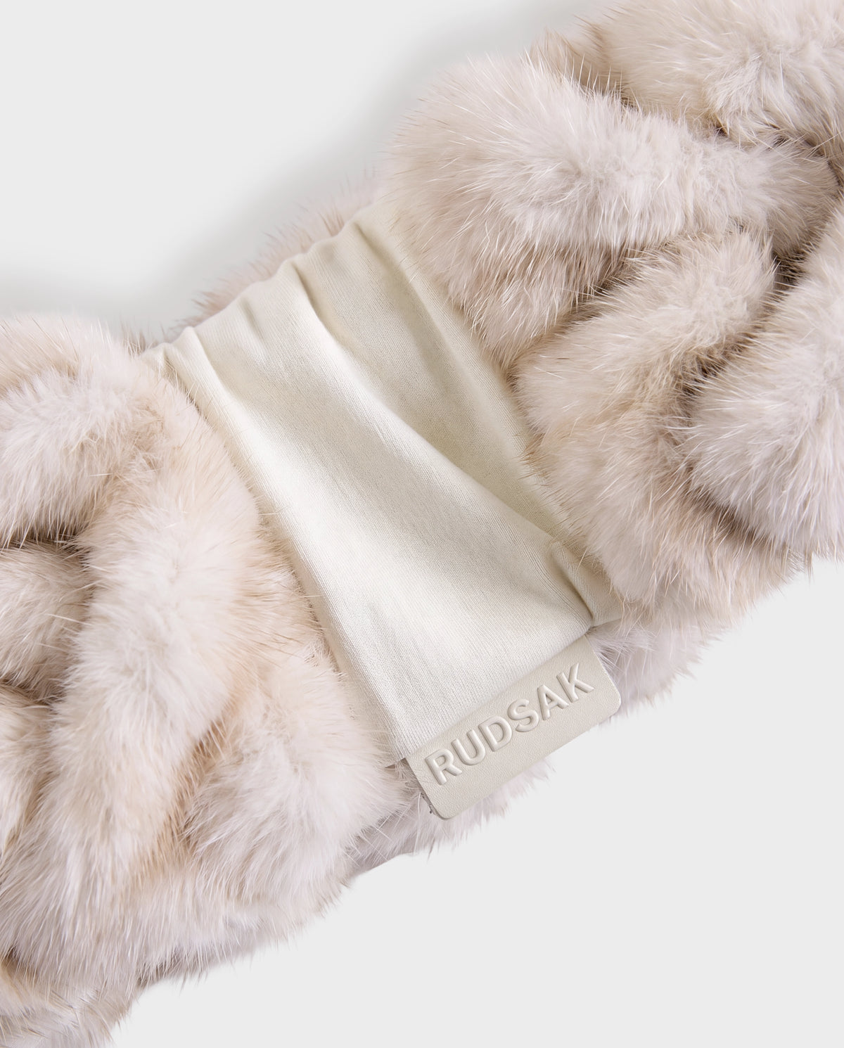 Cream-colored Rudsak MILA - 8426518 Vanilla fur headband with a smooth center panel featuring a branded patch.