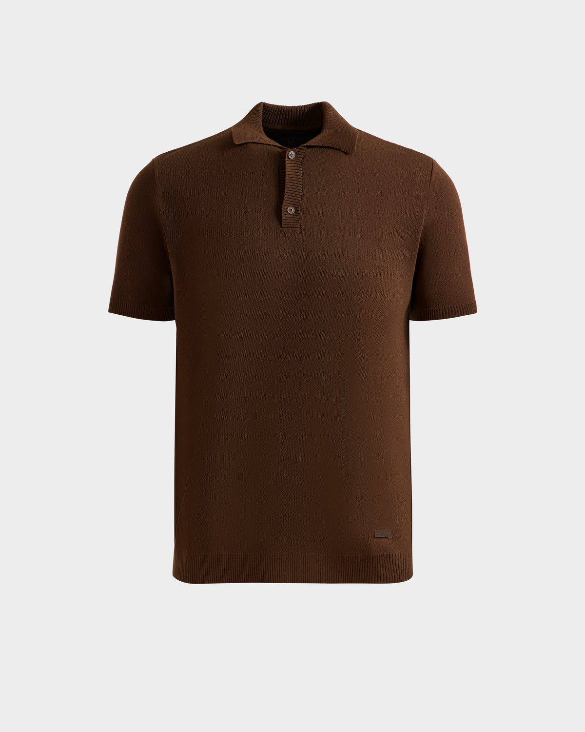 The Rudsak MAISEN - 6524518 Mocha is a men's knit polo shirt in plain brown with a collar and three buttons, shown against a light gray background—an essential for the modern wardrobe.