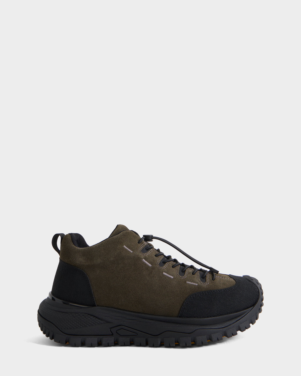 The Rudsak MAX S - 6226505 Olive is a dark green and black men’s sneaker with a thick, rugged sole, black laces, and suede accents. This trail-inspired shoe is shown from the side against a plain white background.