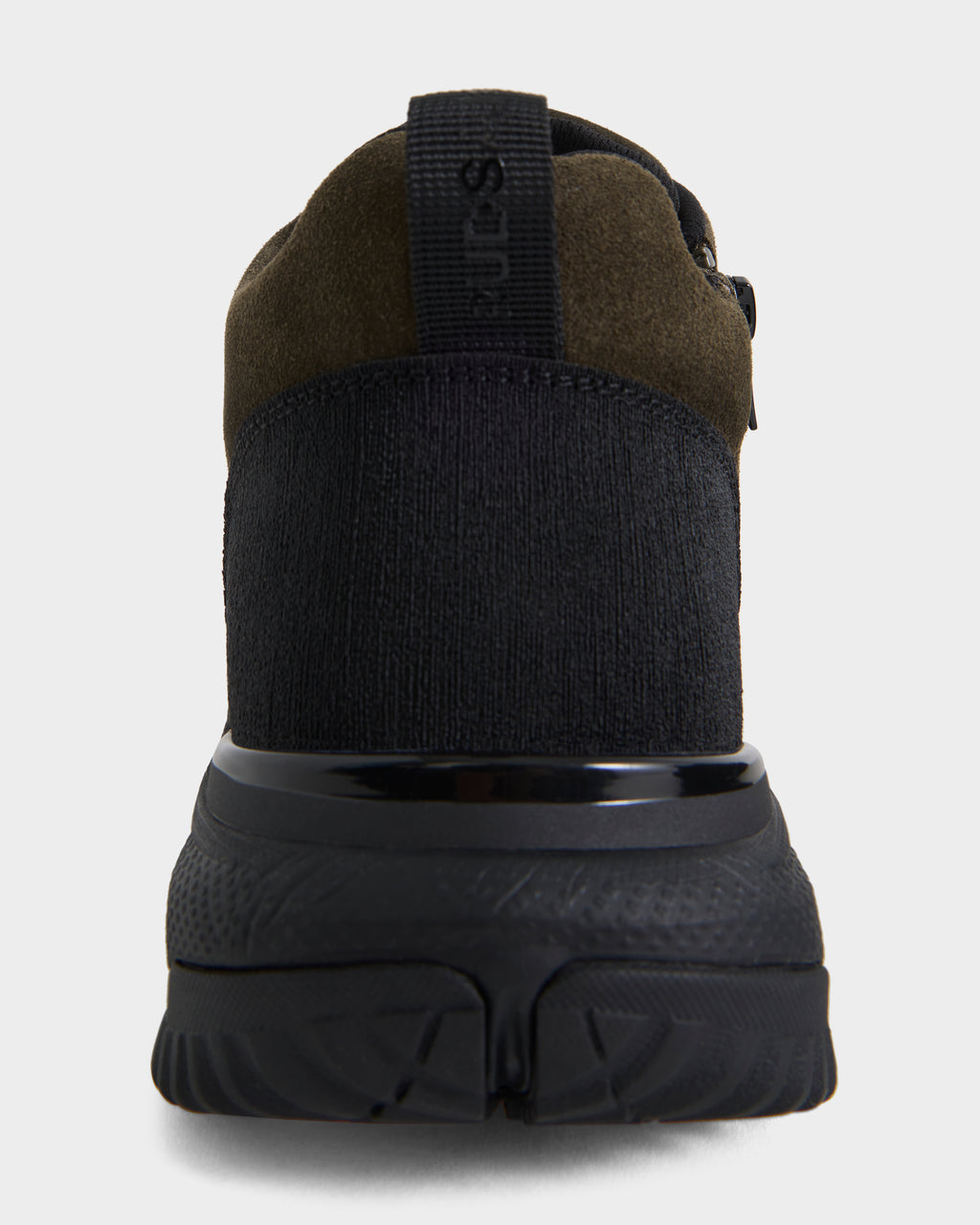 Rear view of the Rudsak MAX S - 6226505 Olive men’s sneaker, showcasing a black and dark brown colorway with a thick, textured sole and a black pull tab at the heel; this trail-inspired athletic shoe is photographed against a plain white background.
