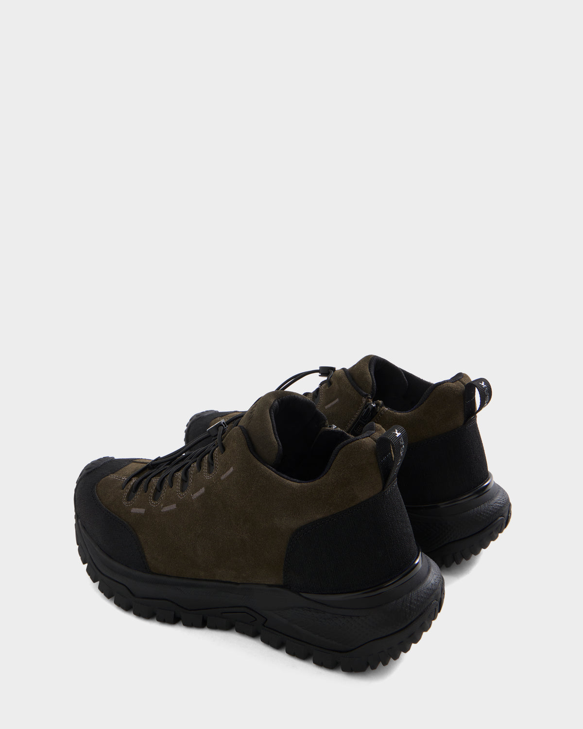 A pair of Rudsak MAX S - 6226505 Olive men’s sneakers in dark olive green and black, featuring suede accents and thick soles, displayed from the back and side angles on a plain white background.