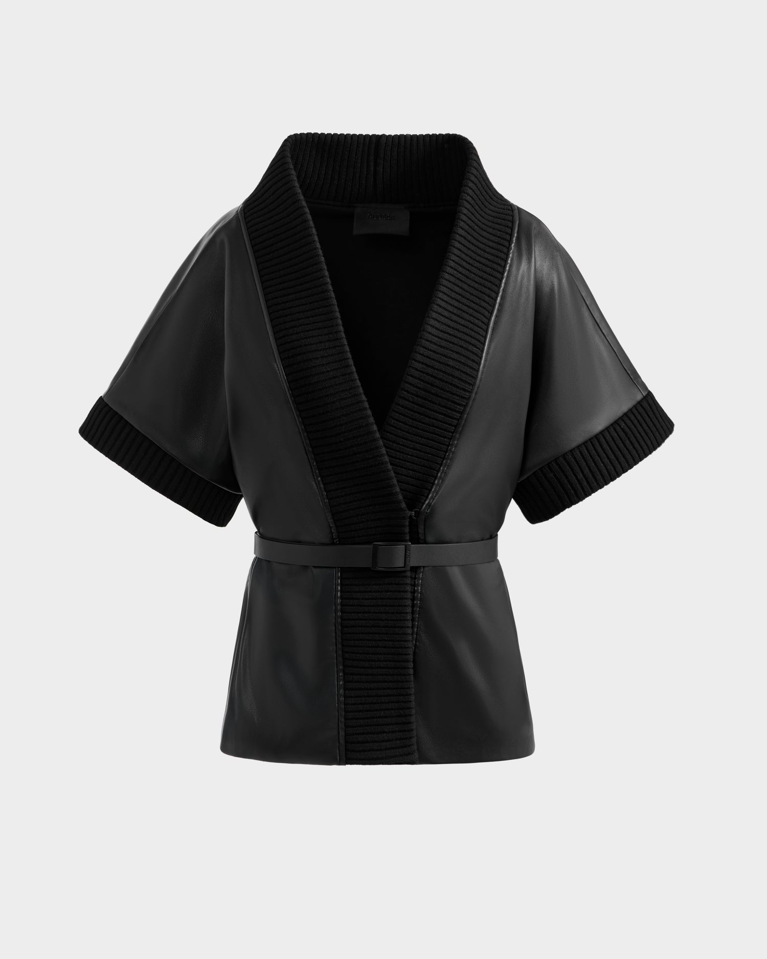 The Rudsak MENDOTA - 8525665 Black is a women's short sleeve vegan leather wrap top with a wide ribbed collar and cuffs, matching ribbed waist belt, and open front, shown on a plain light gray background.