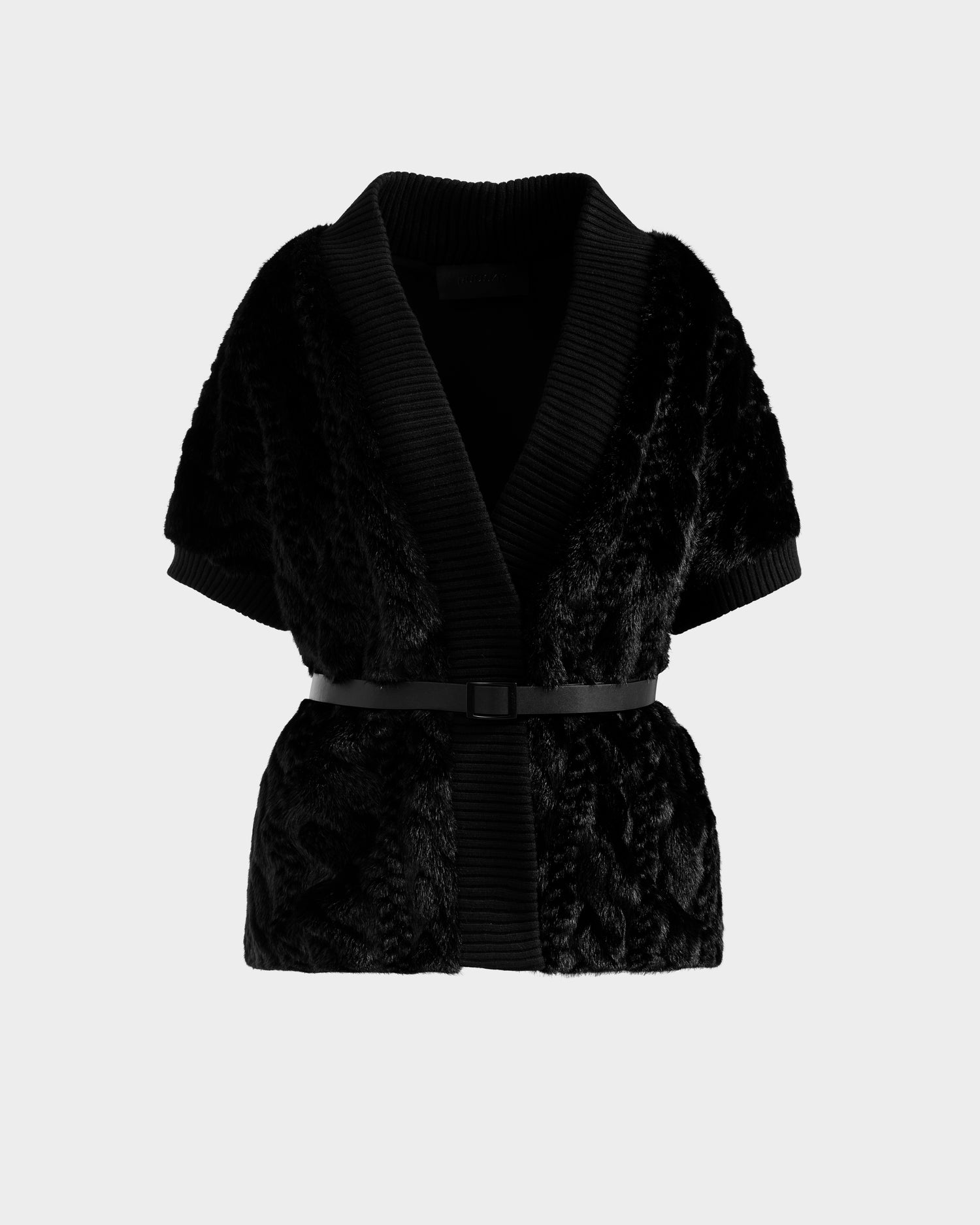 The Rudsak MENDOTA F - 8525561 Black is a short-sleeved faux fur top in black with a shawl collar, ribbed trim, and a vegan leather belt at the waist, shown on a plain white background.