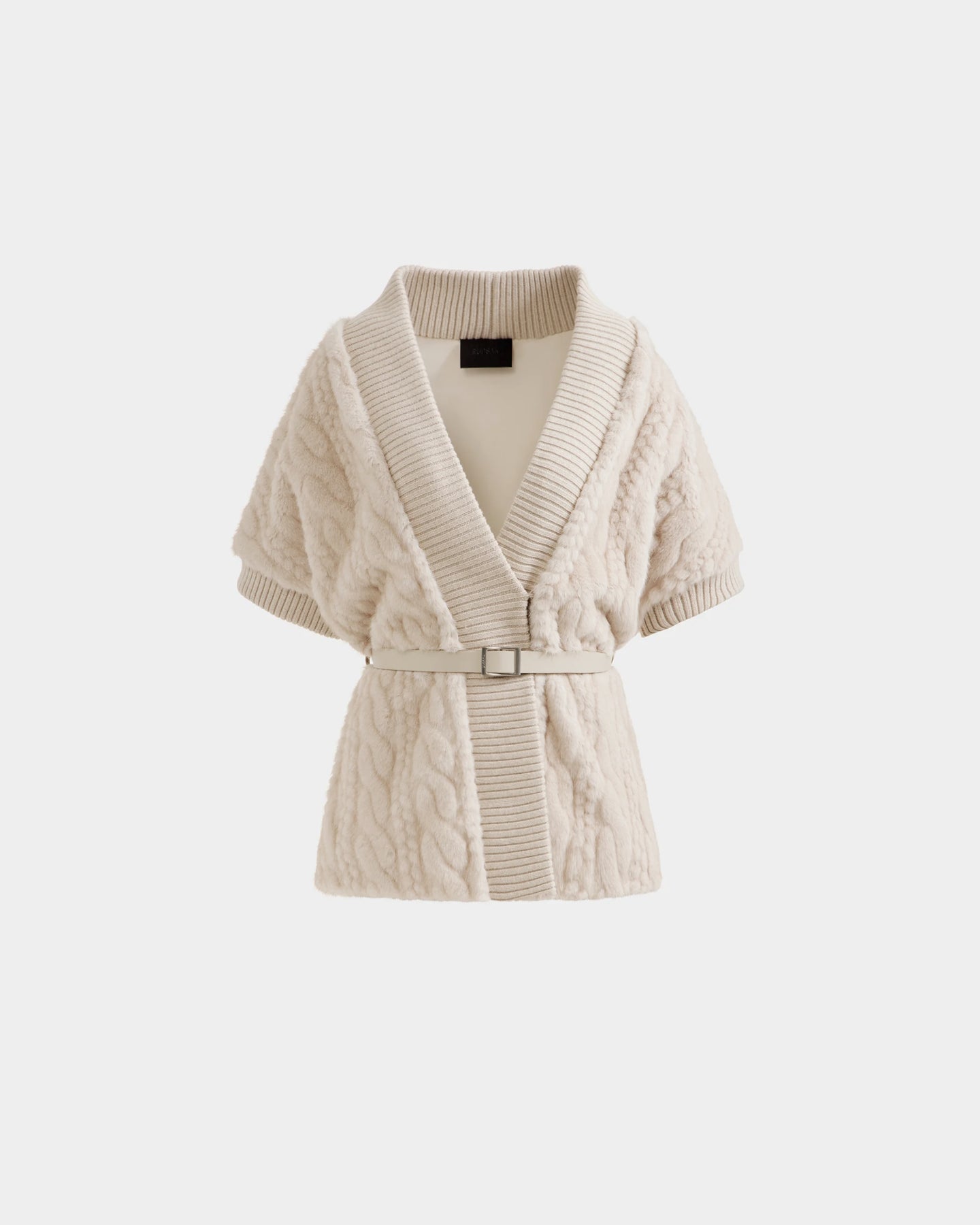 The MENDOTA F - 8525561 Vanilla by Rudsak is a cream, short-sleeved, cable-knit cardigan featuring a wide ribbed shawl collar and matching waist belt, shown on a plain white background.