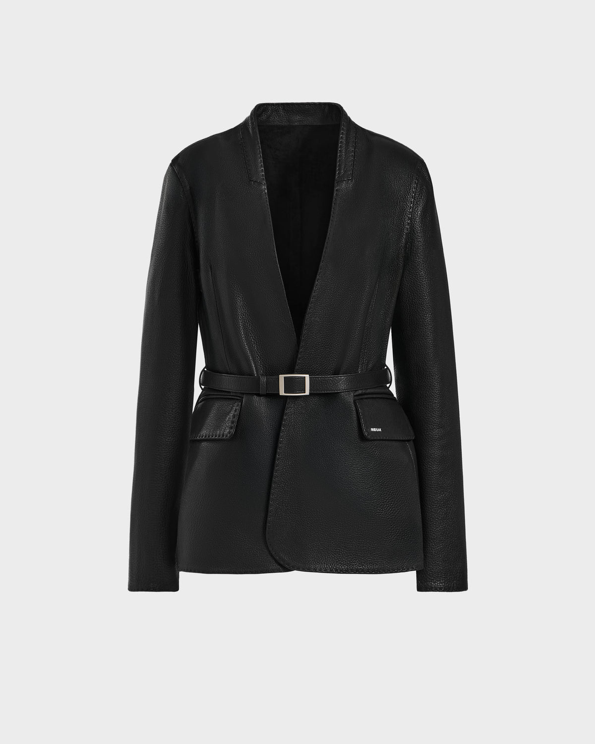 The PAMILA - 8125051 Black by Rudsak is a women’s leather blazer with a belt, offering minimalist sophistication and versatile style for any occasion.