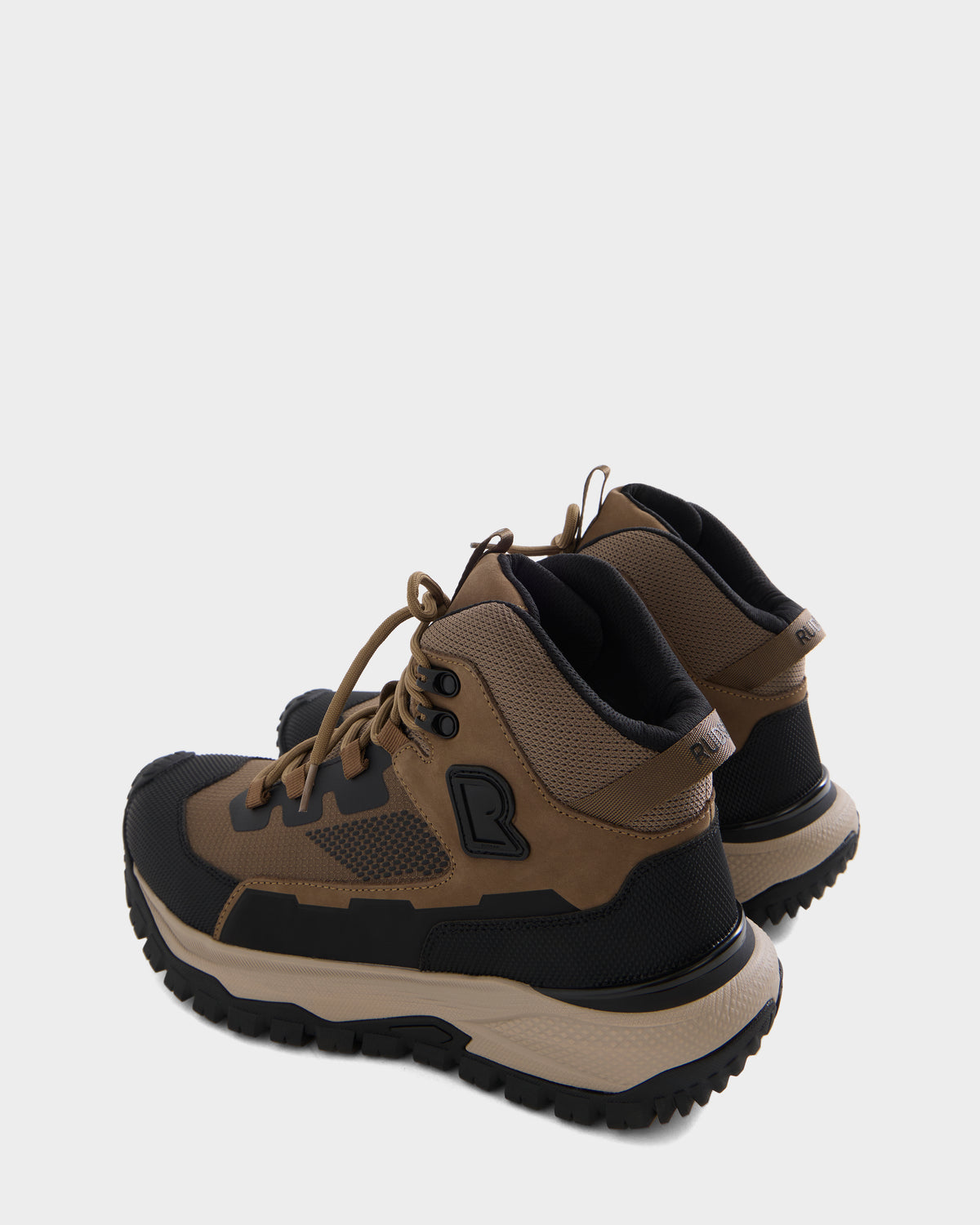 A pair of Rudsak REXON - 6226503 Cement boots with rugged soles, shown from the back and side angles, showcases the stylish durability of winter sneaker boots—set against a plain gray background.