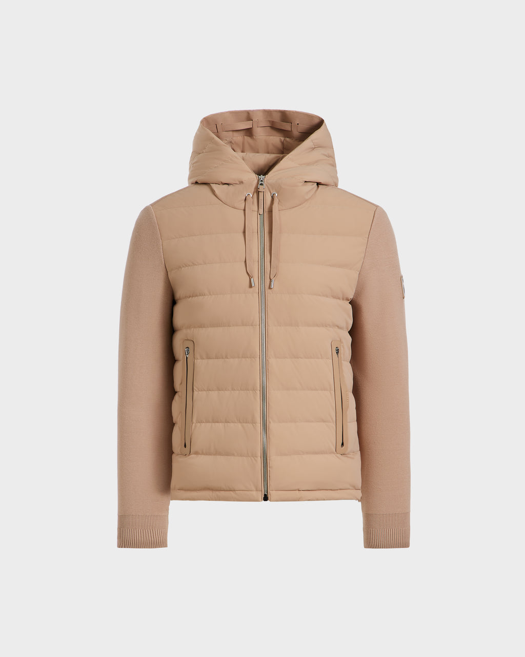 The Rudsak RIVER - 6124584 Almond is a mens beige lightweight down jacket with a hood, quilted front and back, long ribbed sleeves, front zipper closure, and two zippered side pockets, shown on a white background.