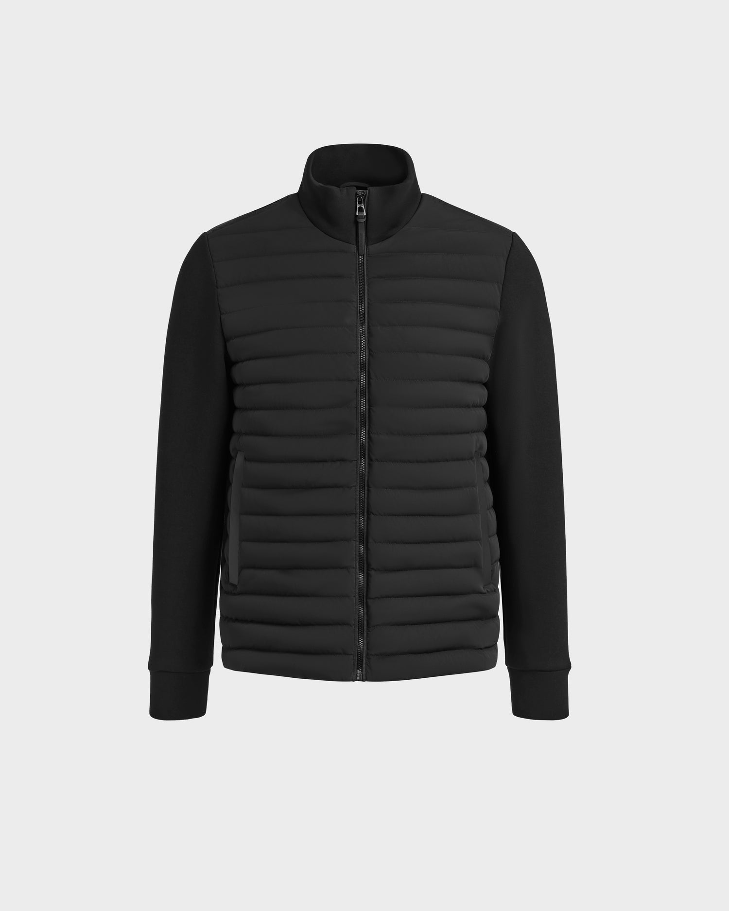 The Rudsak ROMAN - M125010 Black is a black zip-up jacket with long sleeves, a quilted padded front, and smooth sleeves and collar, designed for everyday performance and shown on a plain light gray background.