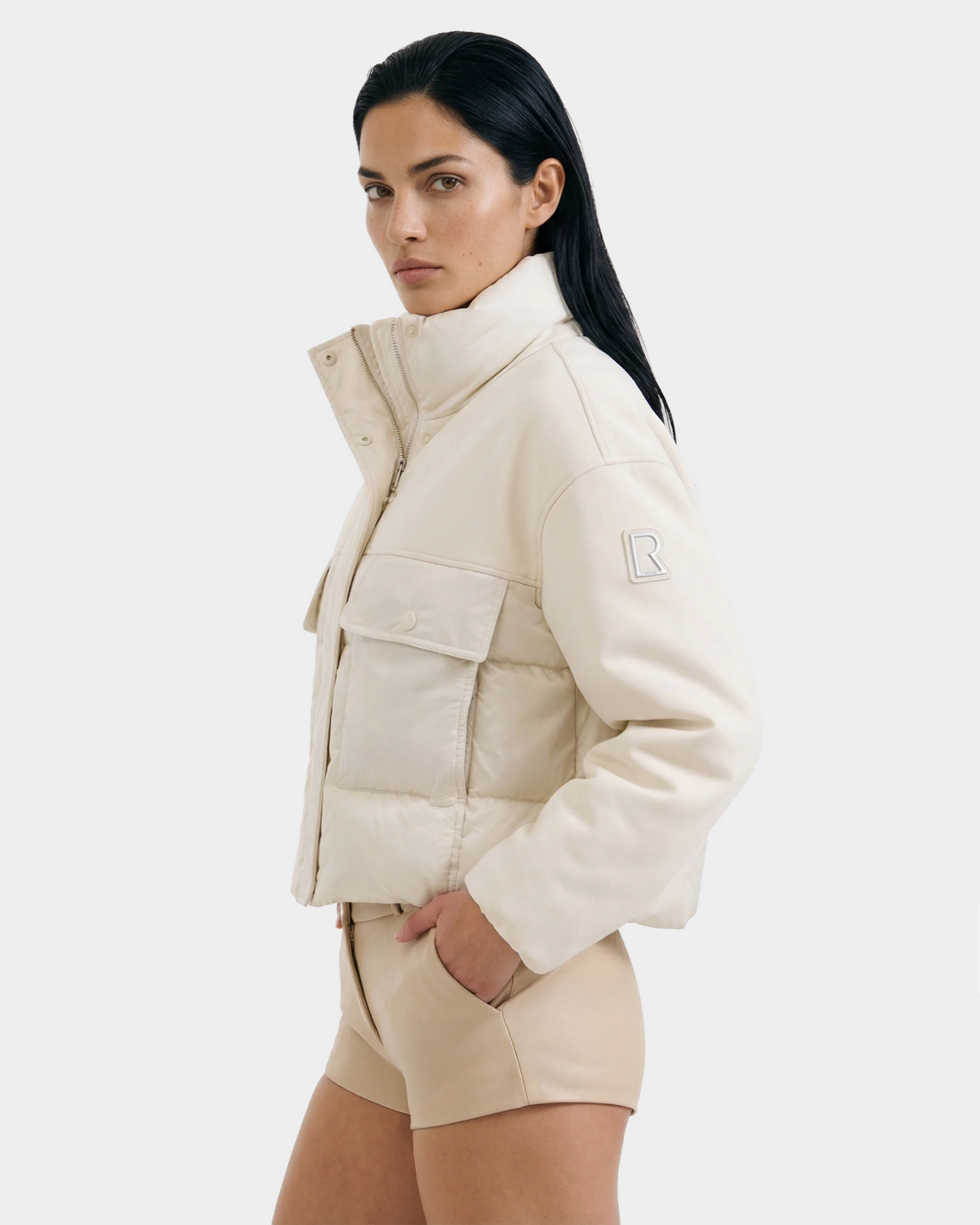 A woman wearing the ROME - 8126028 Iceland cropped spring jacket by Rudsak.