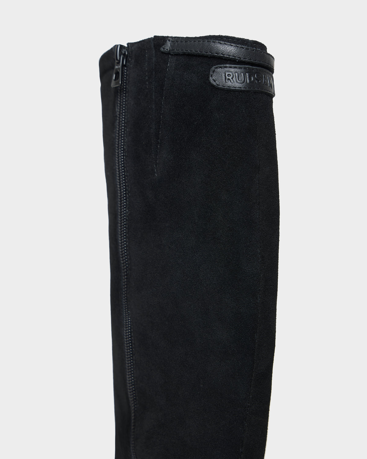 Rudsak STEPRA - 8226524 Black knee-high boot featuring a full-length side zipper and a branded leather patch at the top.