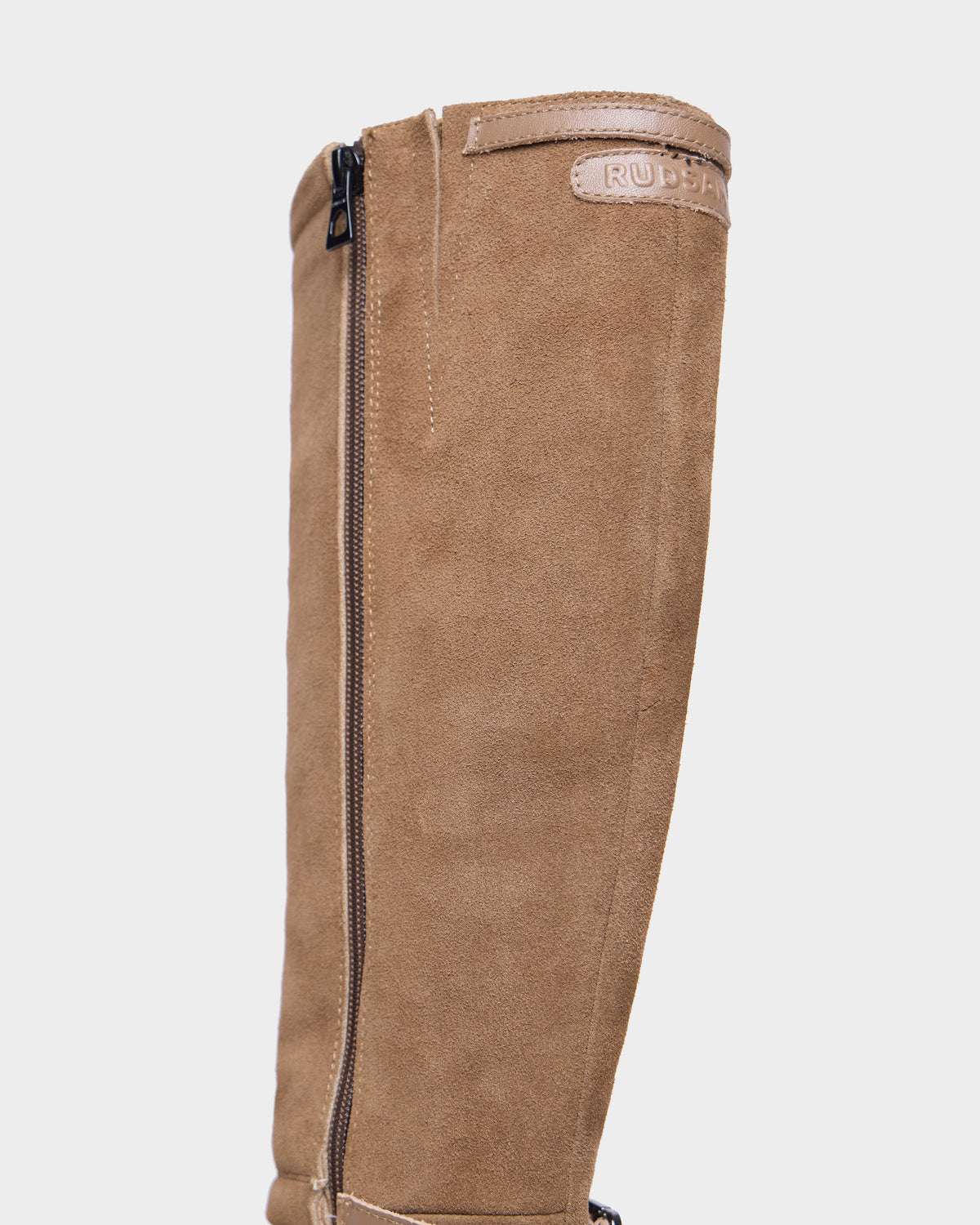 Rudsak STEPRA - 8226524 Camel tan suede knee-high boot with a side zipper and a tab at the top.