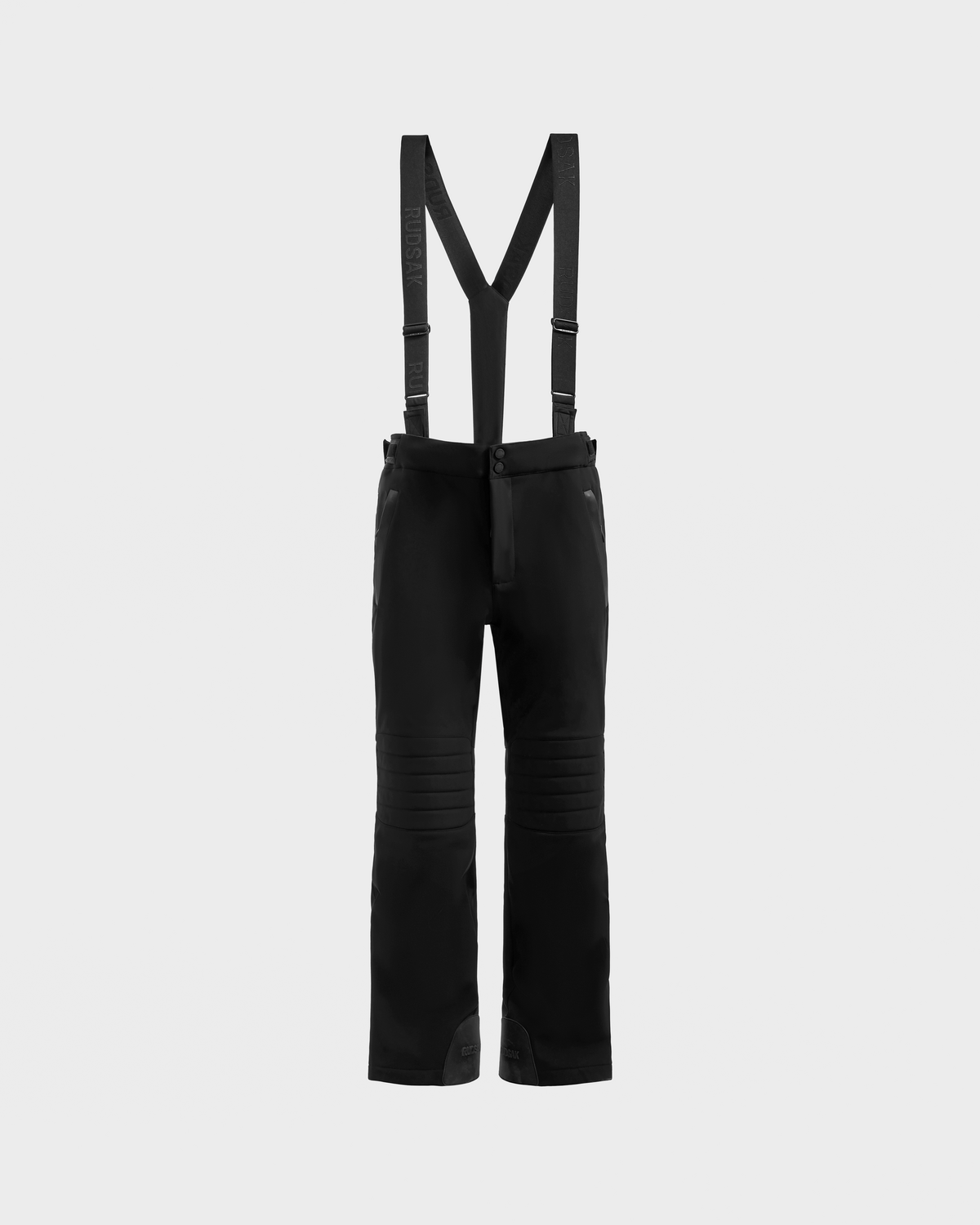 The Rudsak SAMPSON - 6125586 Black men’s performance snow pant features adjustable suspenders, waterproof zippers, a zippered front, and reinforced knees, shown against a plain light gray background.