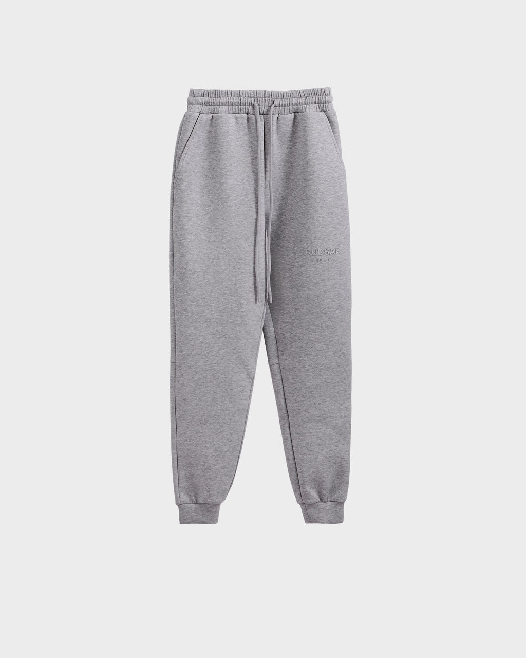 The Rudsak JOSS - 9524009 joggers in heather grey (M) feature premium cotton, an elastic waistband with drawstring, side pockets, and cuffed ankles, shown on a plain white background.