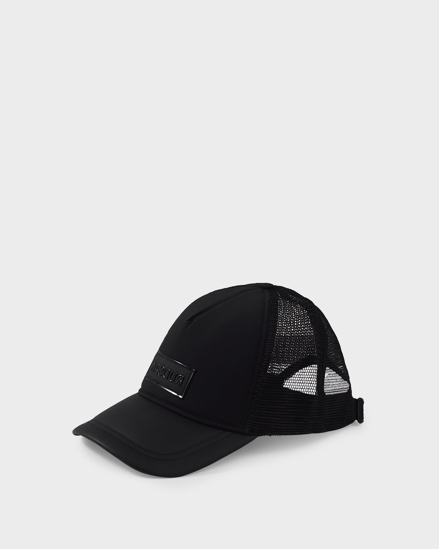The Rudsak FENIX - 9422522 Black trucker cap features a solid front panel with a rectangular patch, curved brim, and adjustable mesh back. Photographed on a plain white background.
